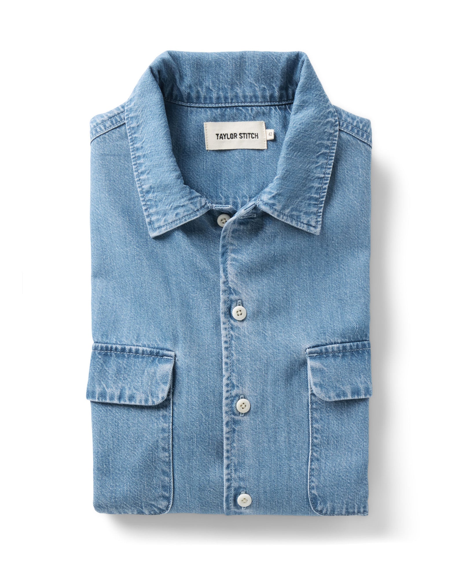 folded flatlay of The Shore Shirt in Washed Indigo Twill, Wovens by Taylor Stitch