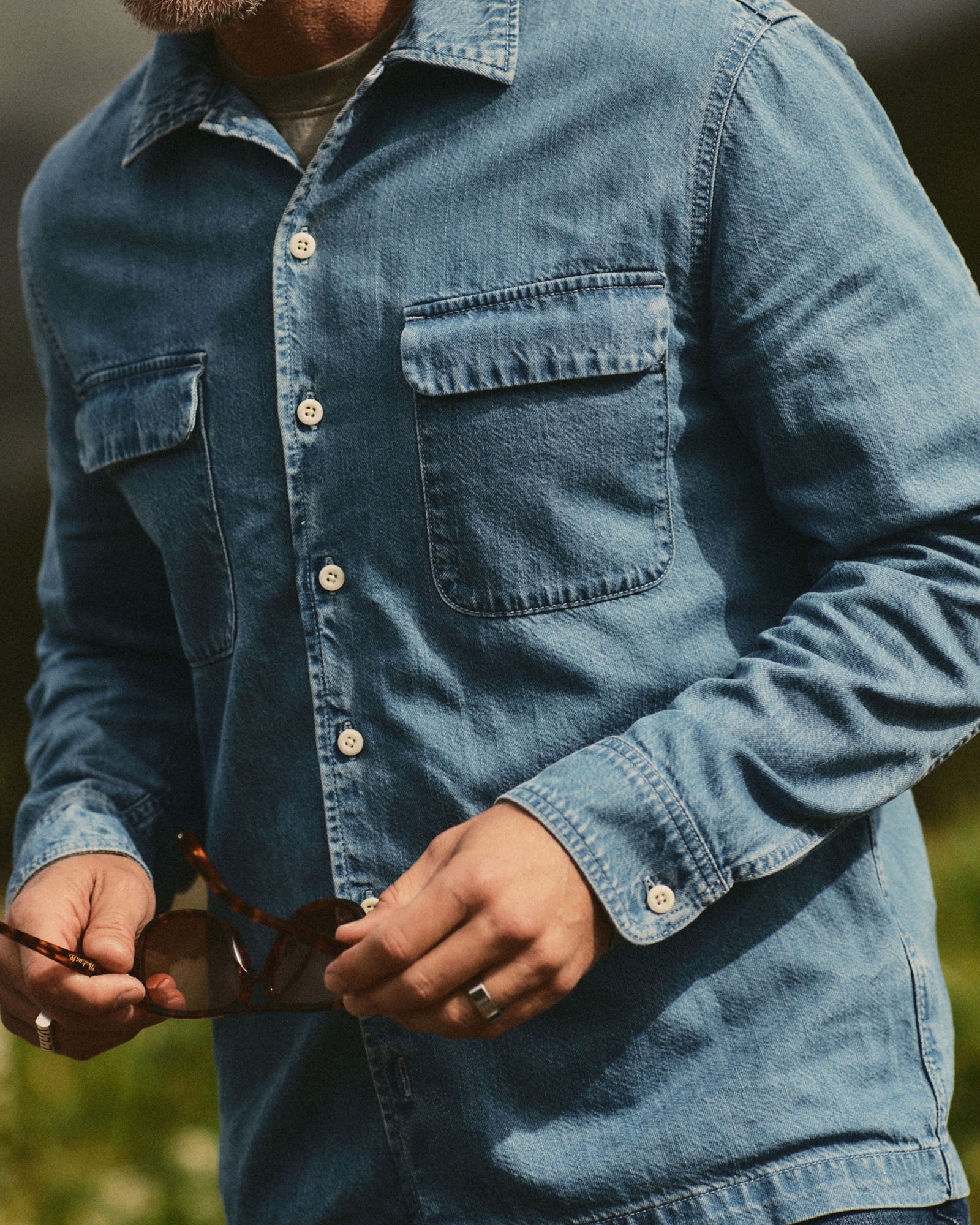 fit model wearing The Shore Shirt in Washed Indigo Twill, Wovens by Taylor Stitch