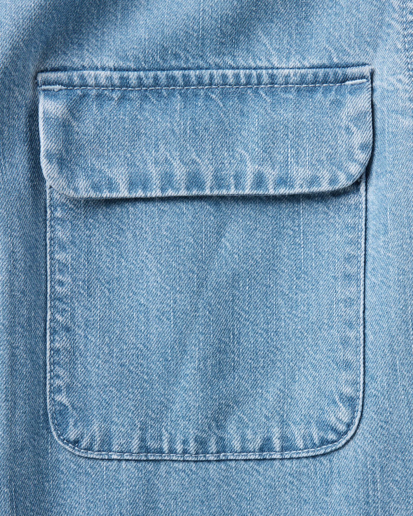 material shot of the pocket on The Shore Shirt in Washed Indigo Twill, Wovens by Taylor Stitch