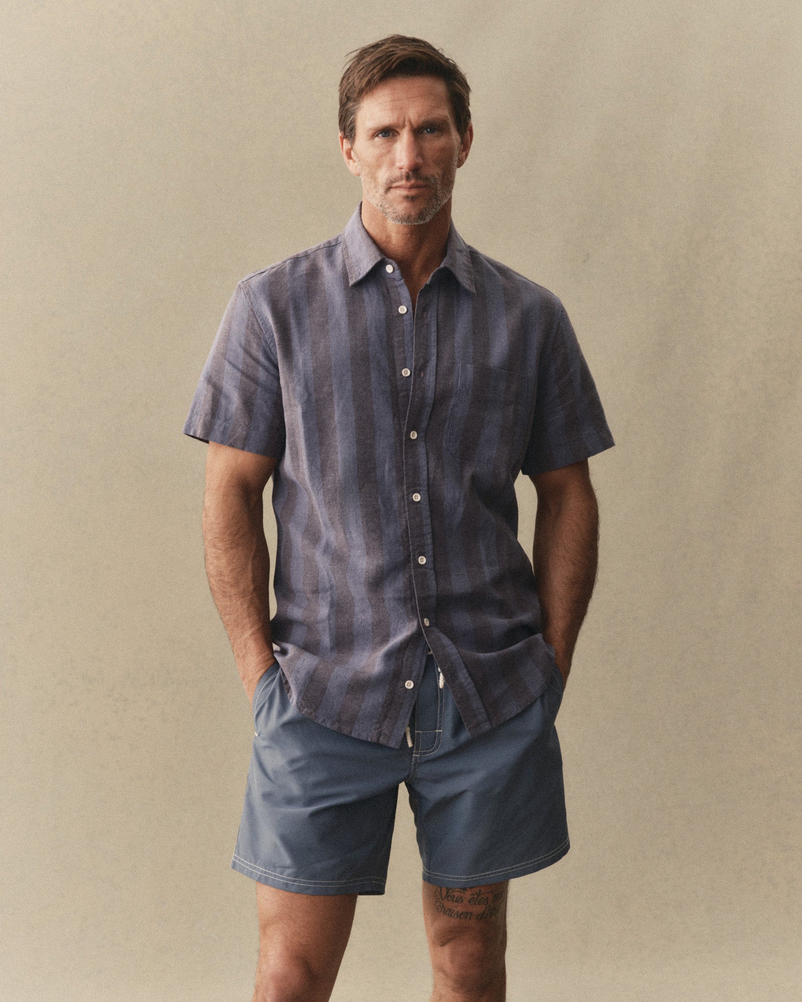 fit model showing off The Short Sleeve California in Blue Stone Stripe Hemp, Wovens by Taylor Stitch