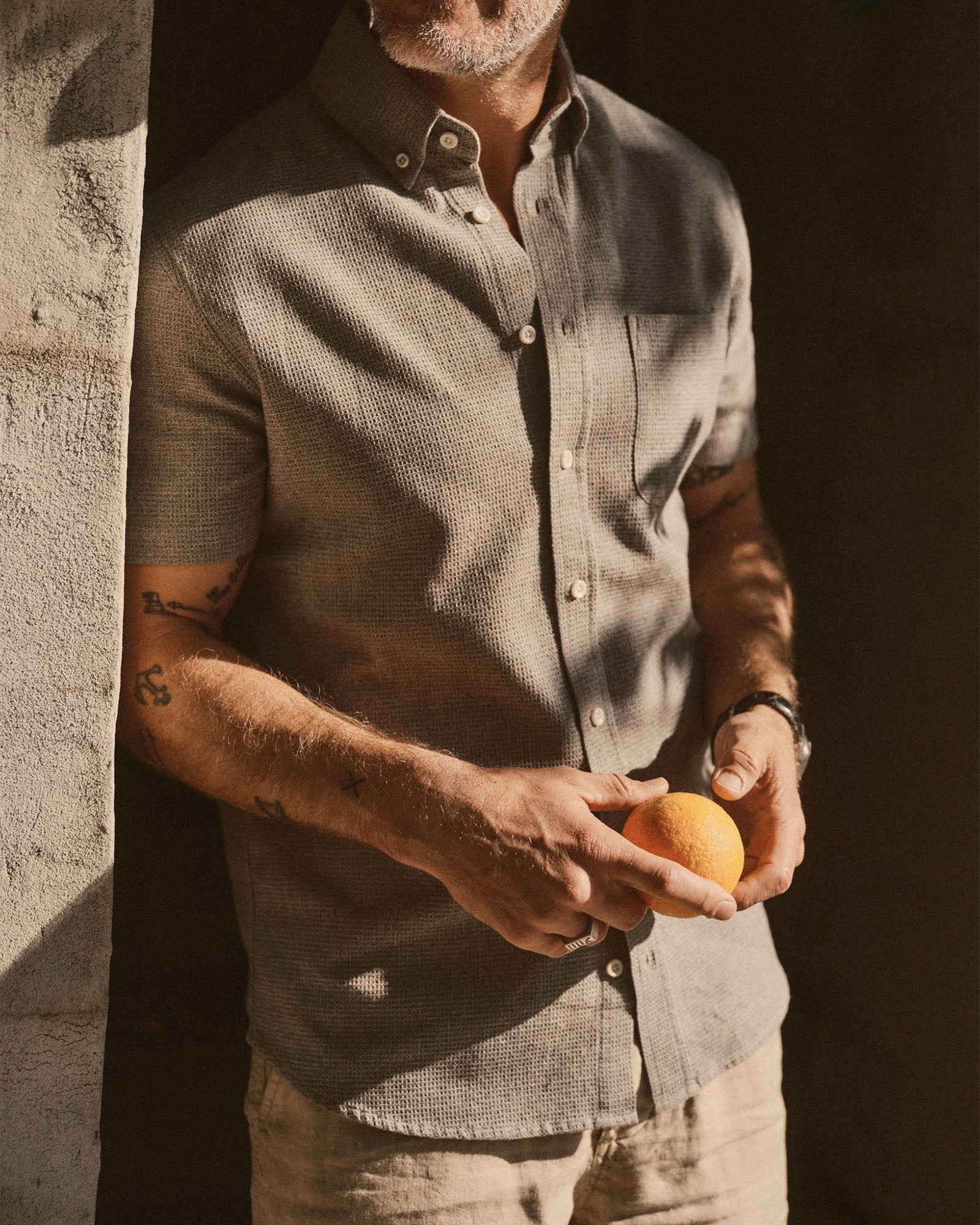 fit model posing in The Short Sleeve Jack in Fern Twist Waffle, Wovens by Taylor Stitch