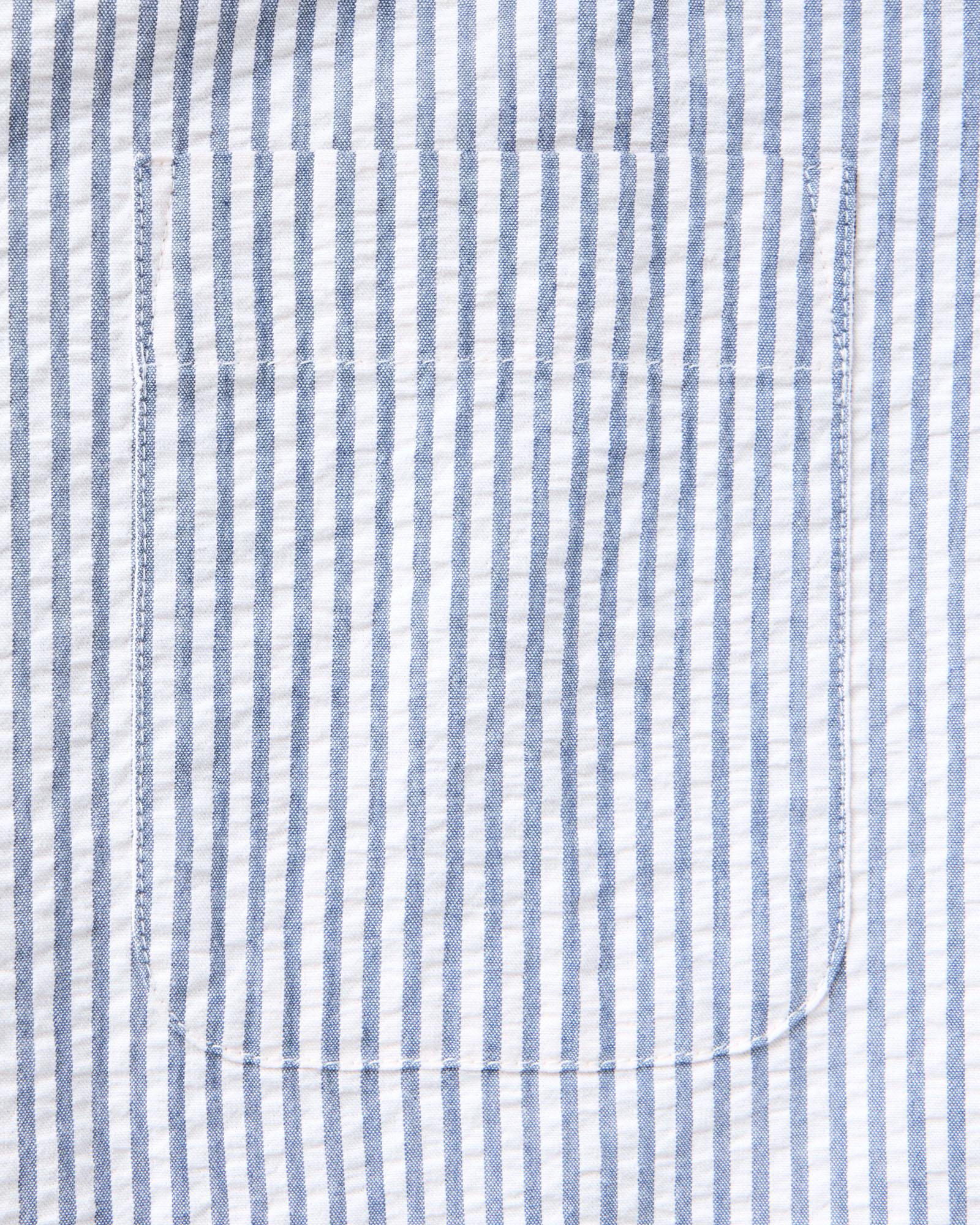 material shot of the pocket on The Short Sleeve Jack in Steel Blue Stripe Seersucker, Wovens by Taylor Stitch