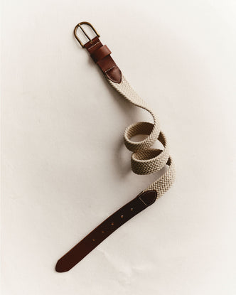 editorial image of The Stretch Braided Belt in Natural on the ground