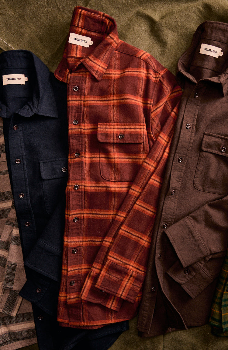 Laydown of seasonal Yosemite flannel shirts