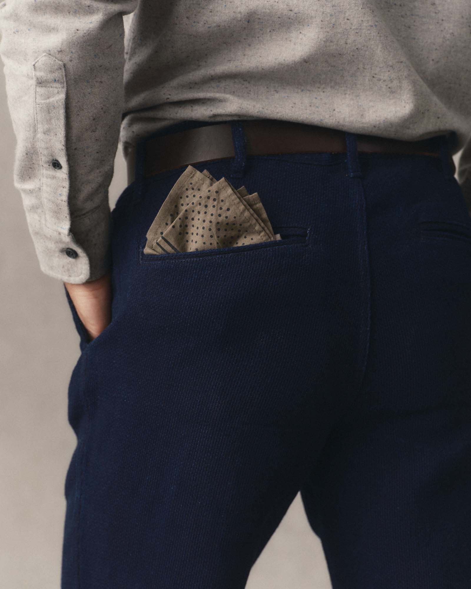 fit model showing off the back pocket on The Camden Pant in Rinsed Indigo Sashiko, Bottoms by Taylor Stitch