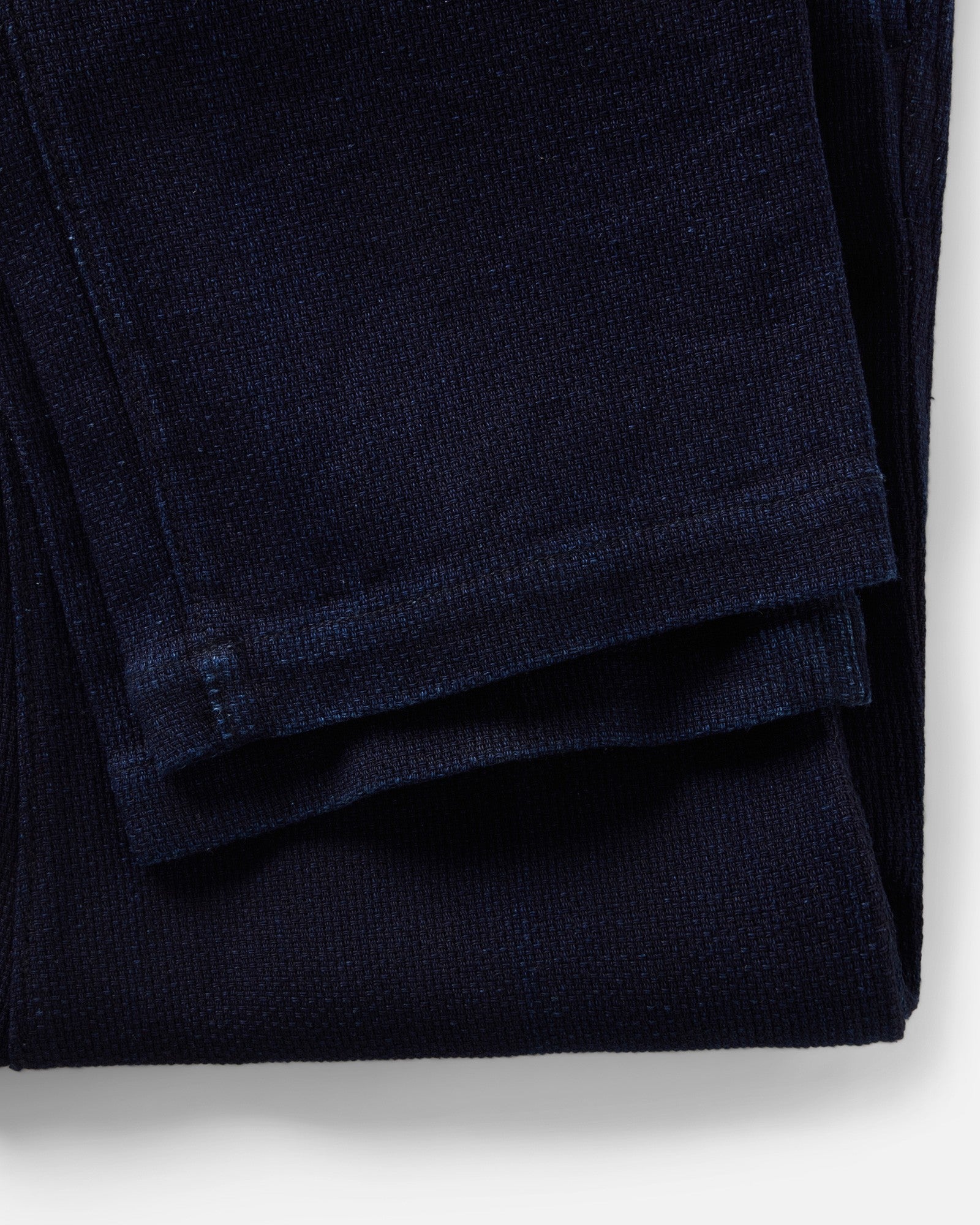 material shot of the hem on The Camden Pant in Rinsed Indigo Sashiko, Bottoms by Taylor Stitch