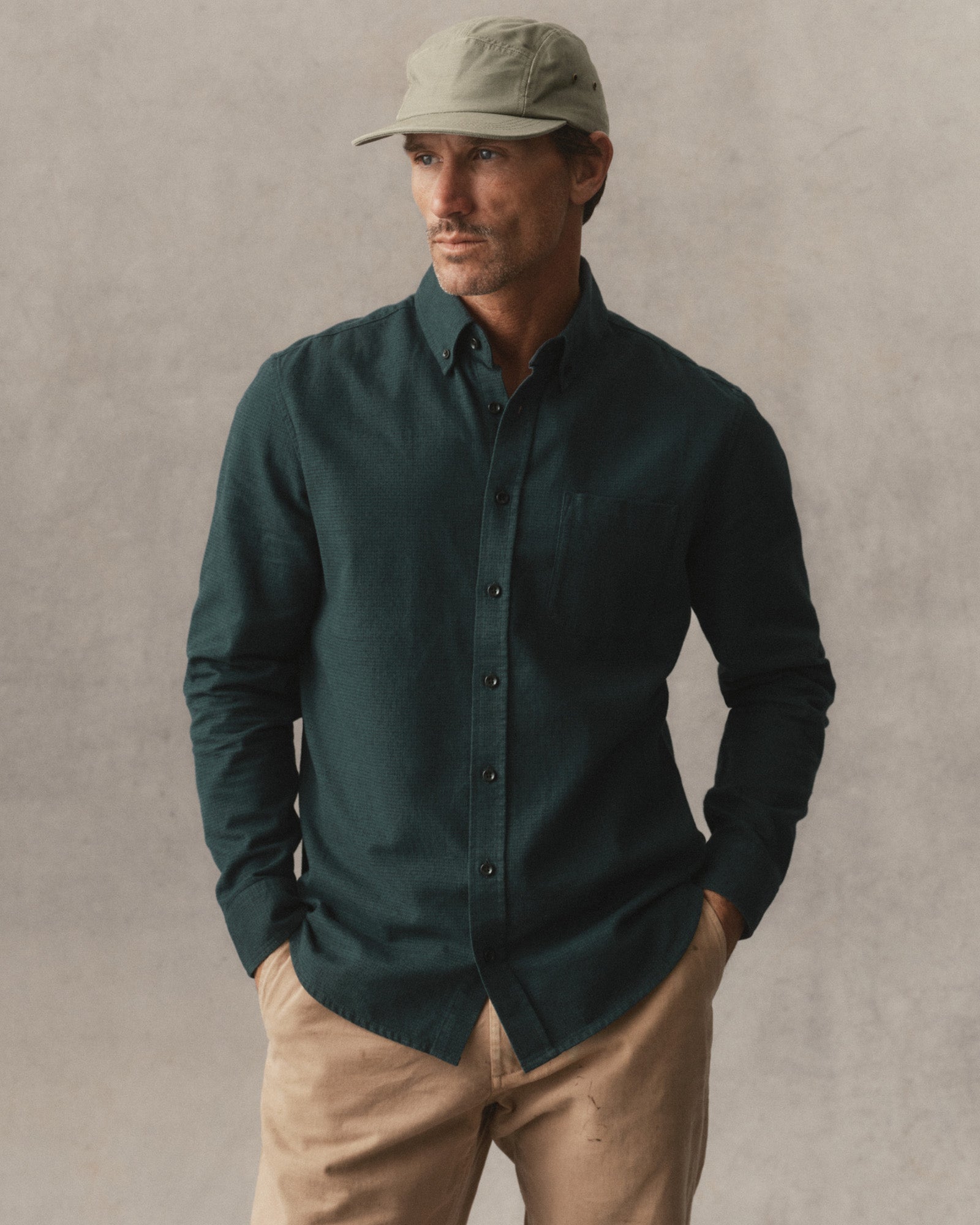 fit model with his hands in his pockets wearing The Jack in Spruce Houndstooth, Wovens by Taylor Stitch