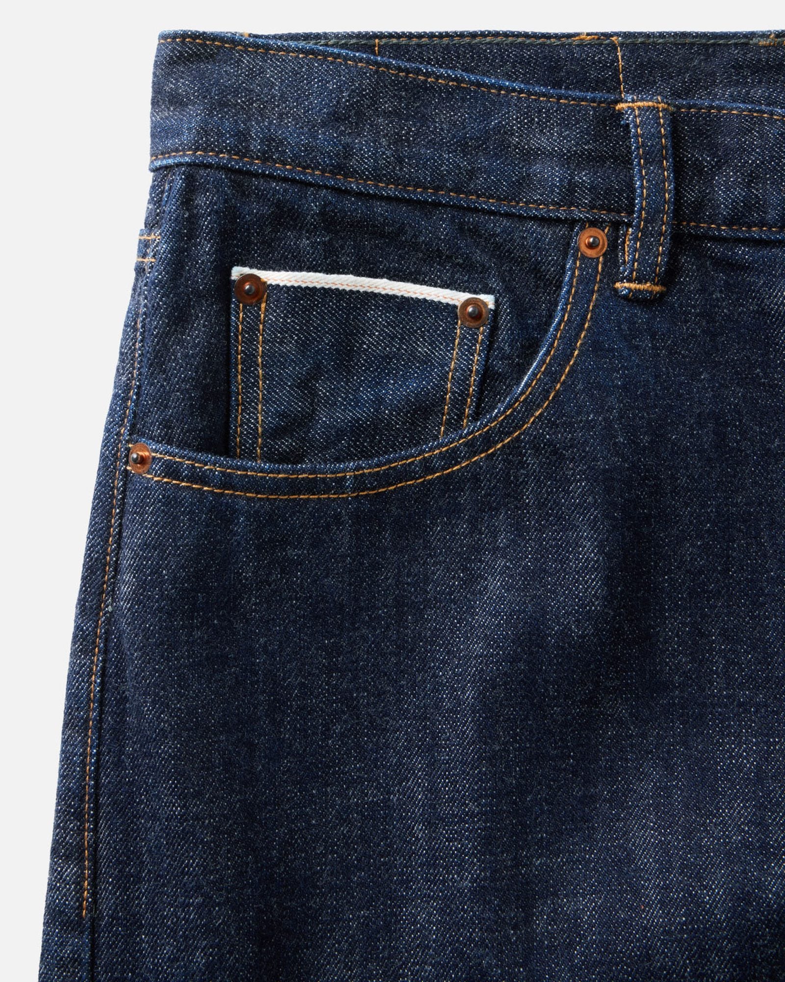 material shot of the pocket on The Democratic Jean in Rinsed Organic Selvedge, Bottoms by Taylor Stitch