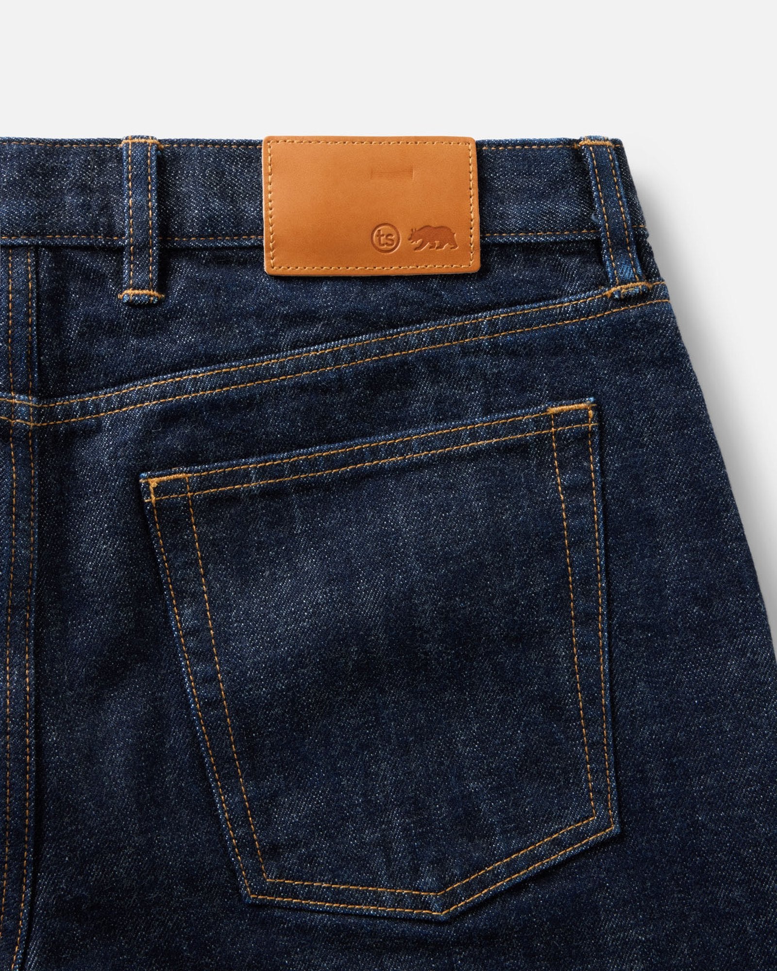 material shot of the back pocket on The Democratic Jean in Rinsed Organic Selvedge, Bottoms by Taylor Stitch