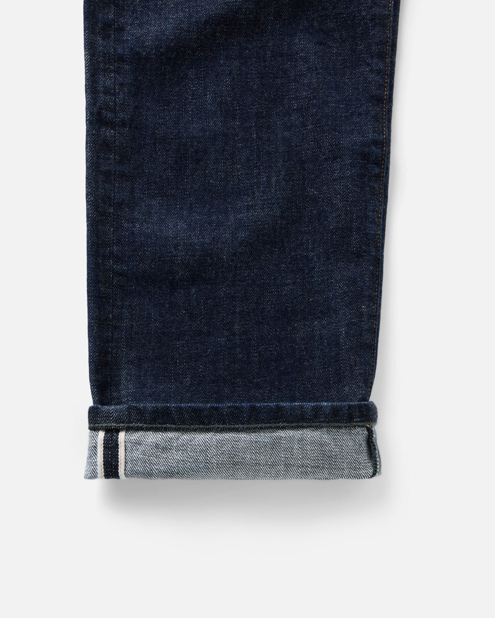 material shot of the bottom cuff on The Democratic Jean in Rinsed Organic Selvedge, Bottoms by Taylor Stitch