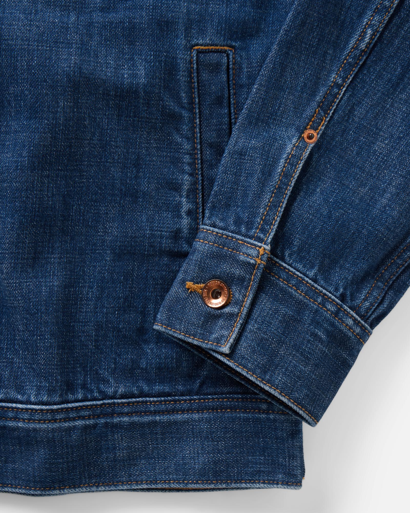 material shot of the sleeve on The Long Haul Jacket in Mid Wash Organic Selvedge, Outerwear by Taylor Stitch