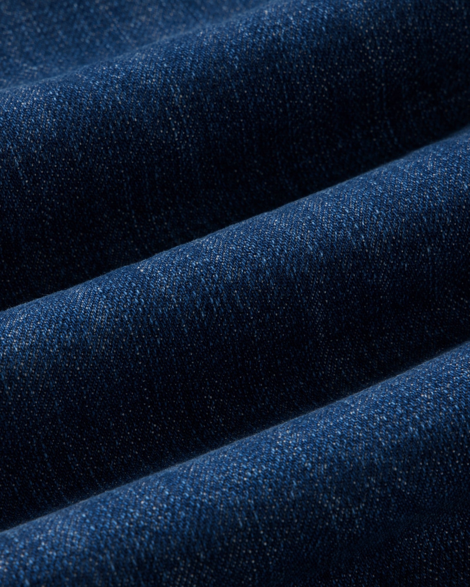 material shot of the fabric on The Long Haul Jacket in Mid Wash Organic Selvedge, Outerwear by Taylor Stitch