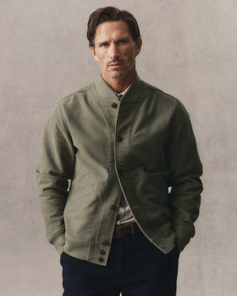 fit model posing in The Clark Bomber in Smoked Olive Moleskin