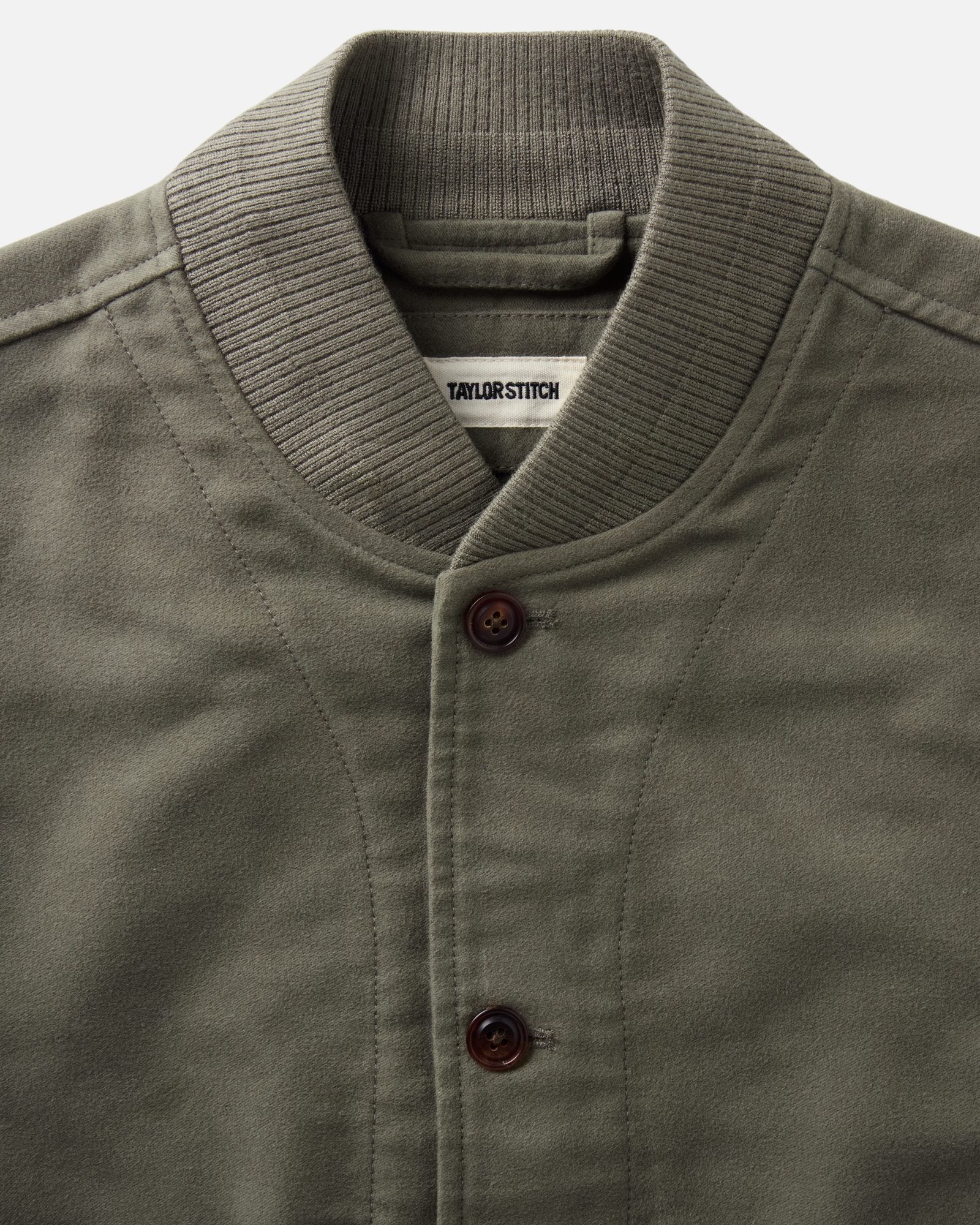 material shot of the collar on The Clark Bomber in Smoked Olive Moleskin, Outerwear by Taylor Stitch