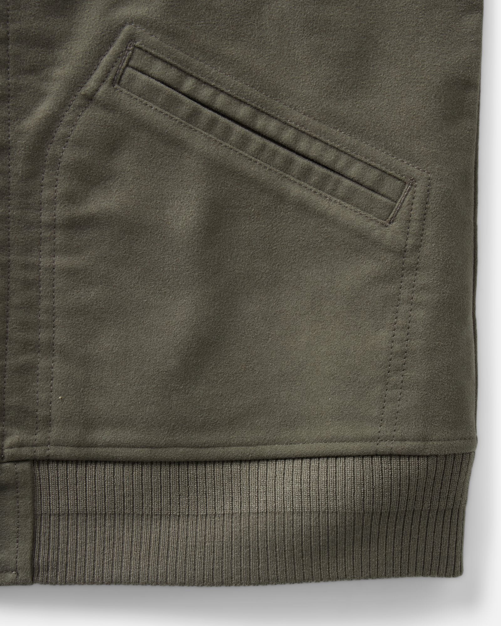material shot of the pocket on The Clark Bomber in Smoked Olive Moleskin, Outerwear by Taylor Stitch