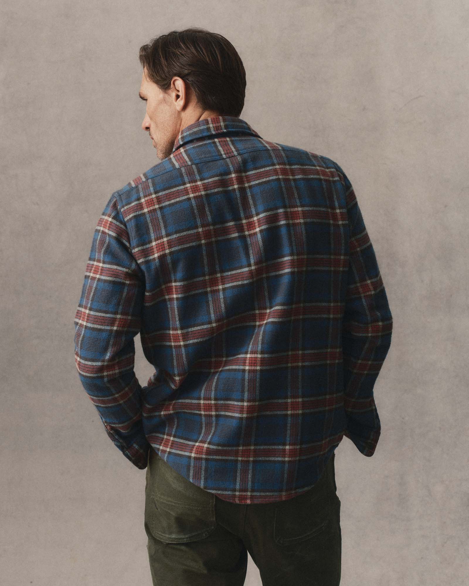 fit model showing off the back of The Crater Shirt in Headland Plaid, Wovens by Taylor Stitch