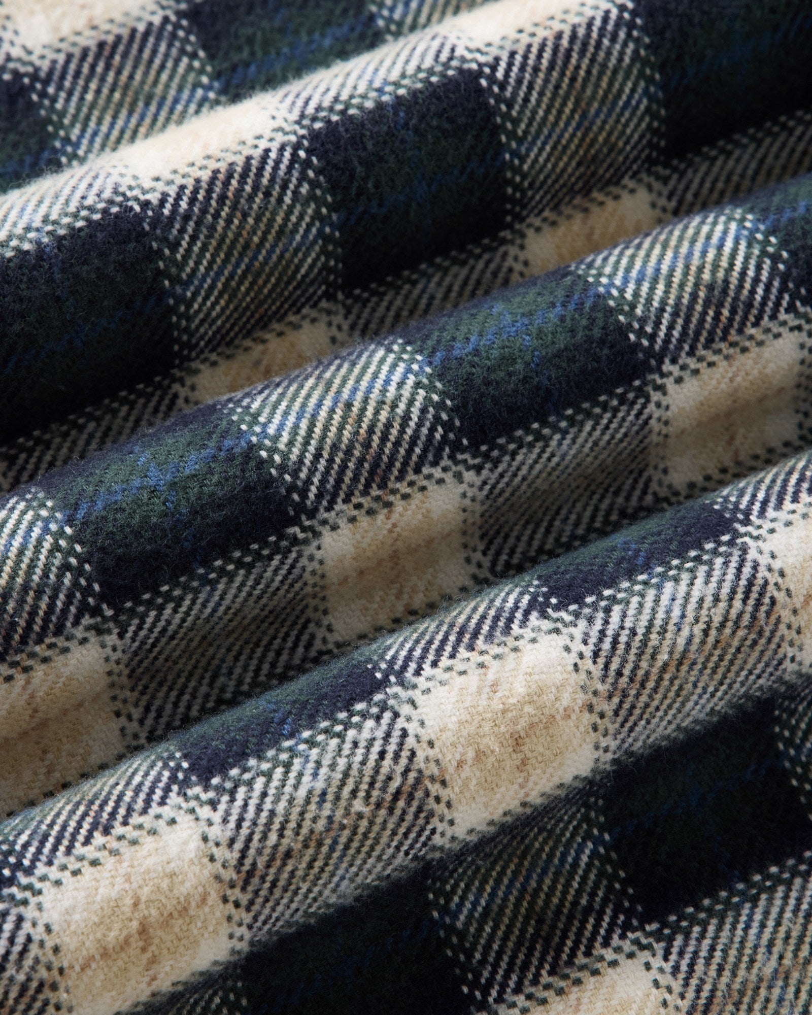 material shot of the fabric on The Crater Shirt in Woodland Plaid, Wovens by Taylor Stitch