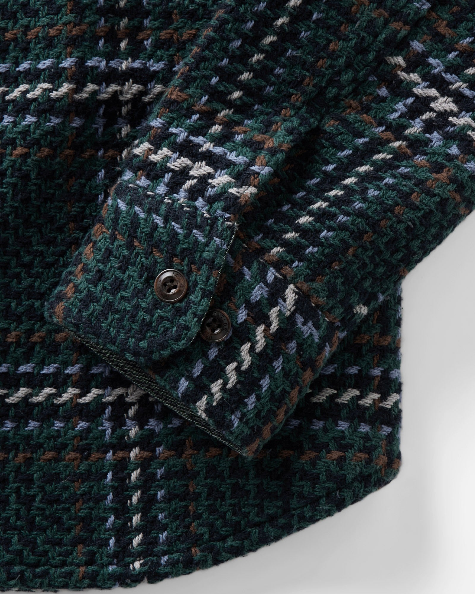 material shot of the sleeve on The Cutter Overshirt in Canal Check, Wovens by Taylor Stitch