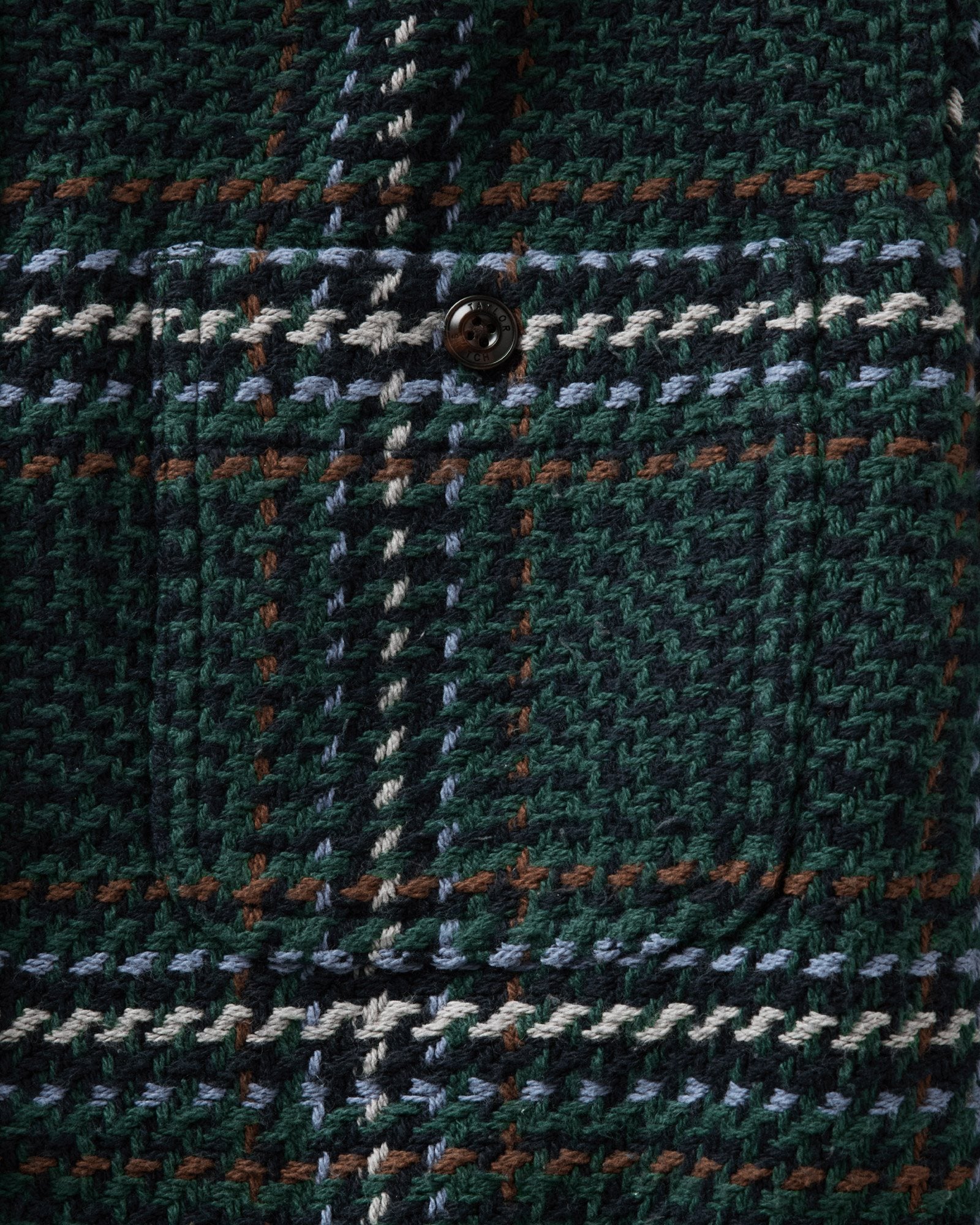 material shot of the pocket on The Cutter Overshirt in Canal Check, Wovens by Taylor Stitch