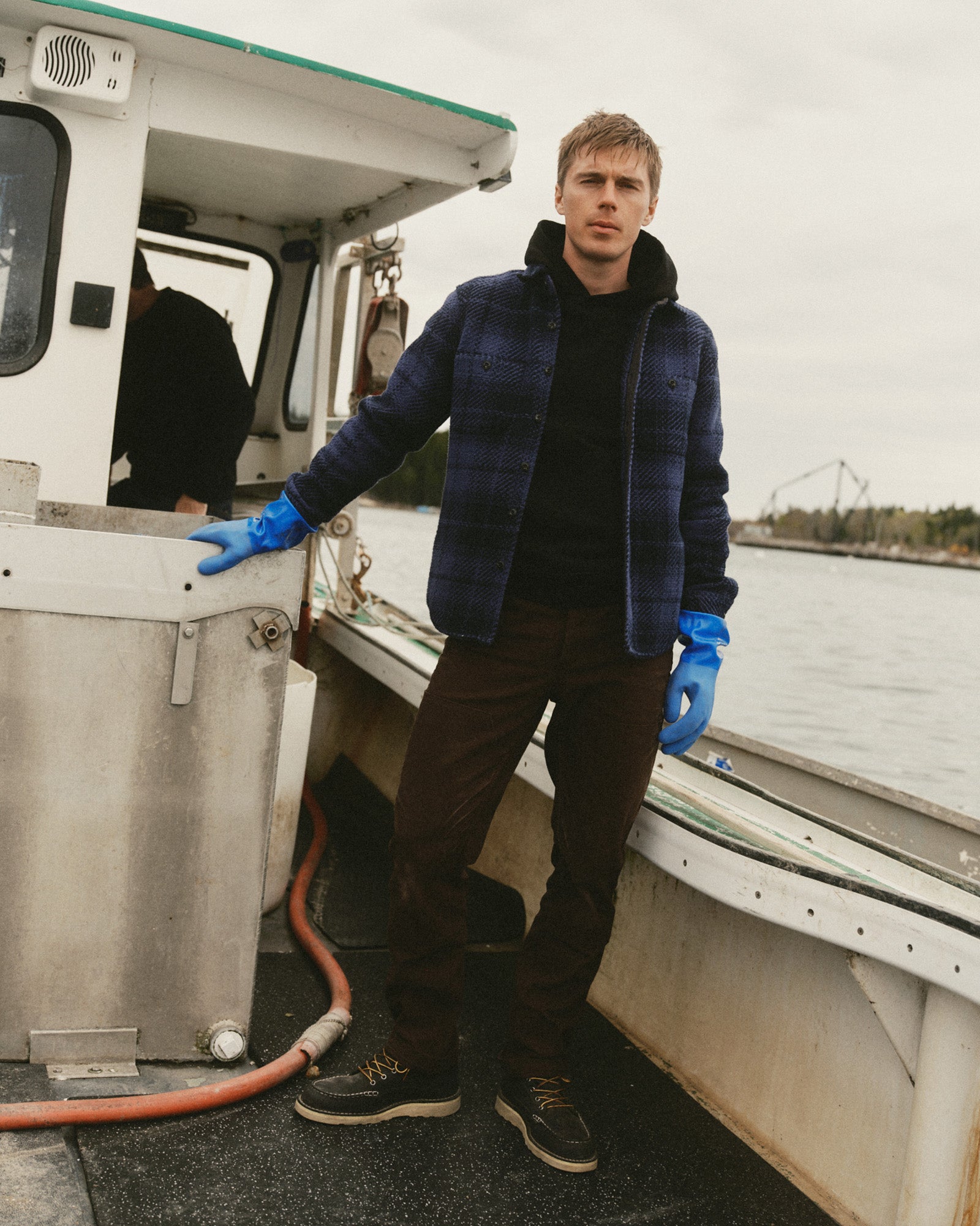 fit model posing in The Cutter Overshirt in Lighthouse Check, Wovens by Taylor Stitch
