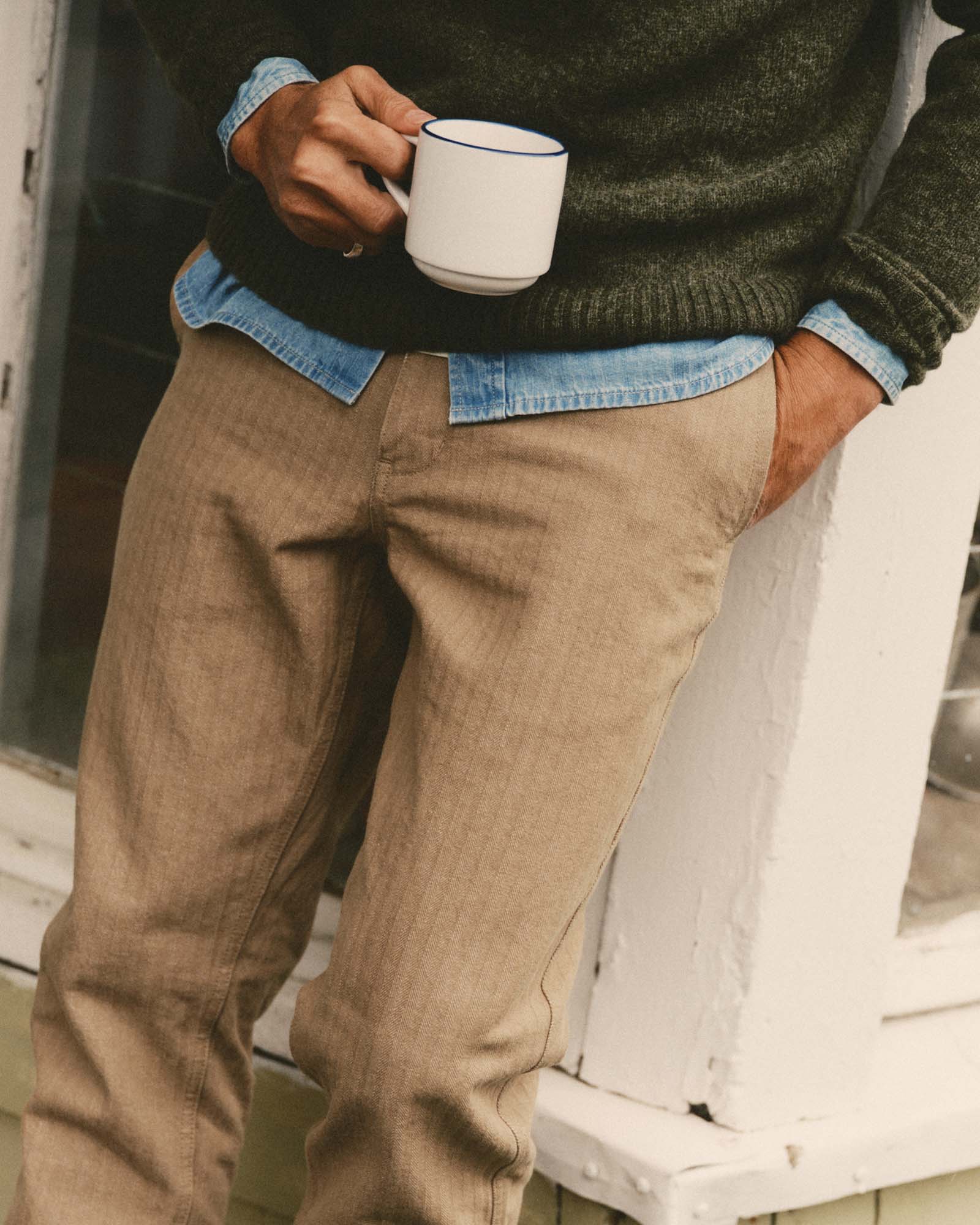 fit model showing off The Emlen Pant in Khaki Herringbone, Bottoms by Taylor Stitch