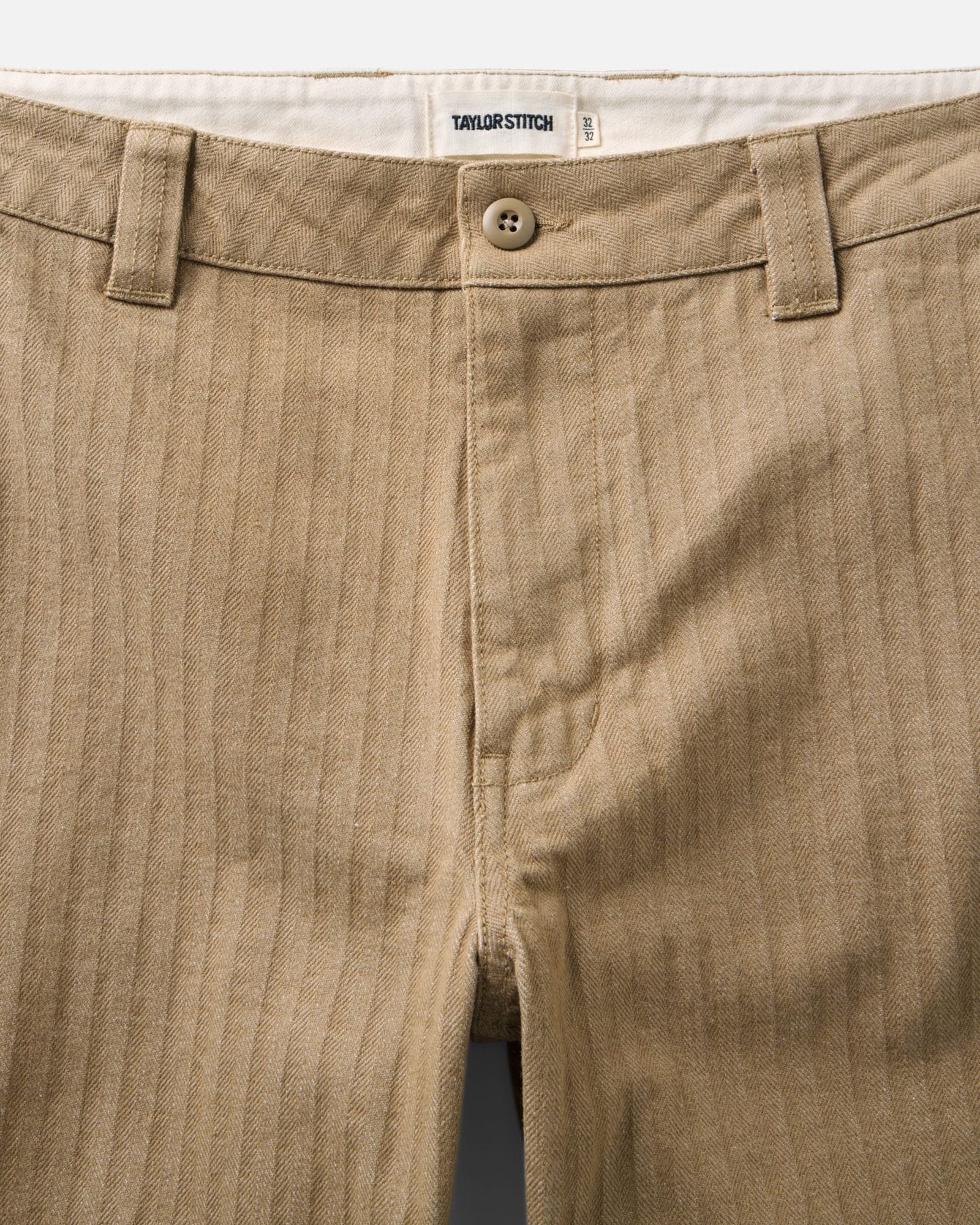 material shot of the waistband on The Emlen Pant in Khaki Herringbone, Bottoms by Taylor Stitch