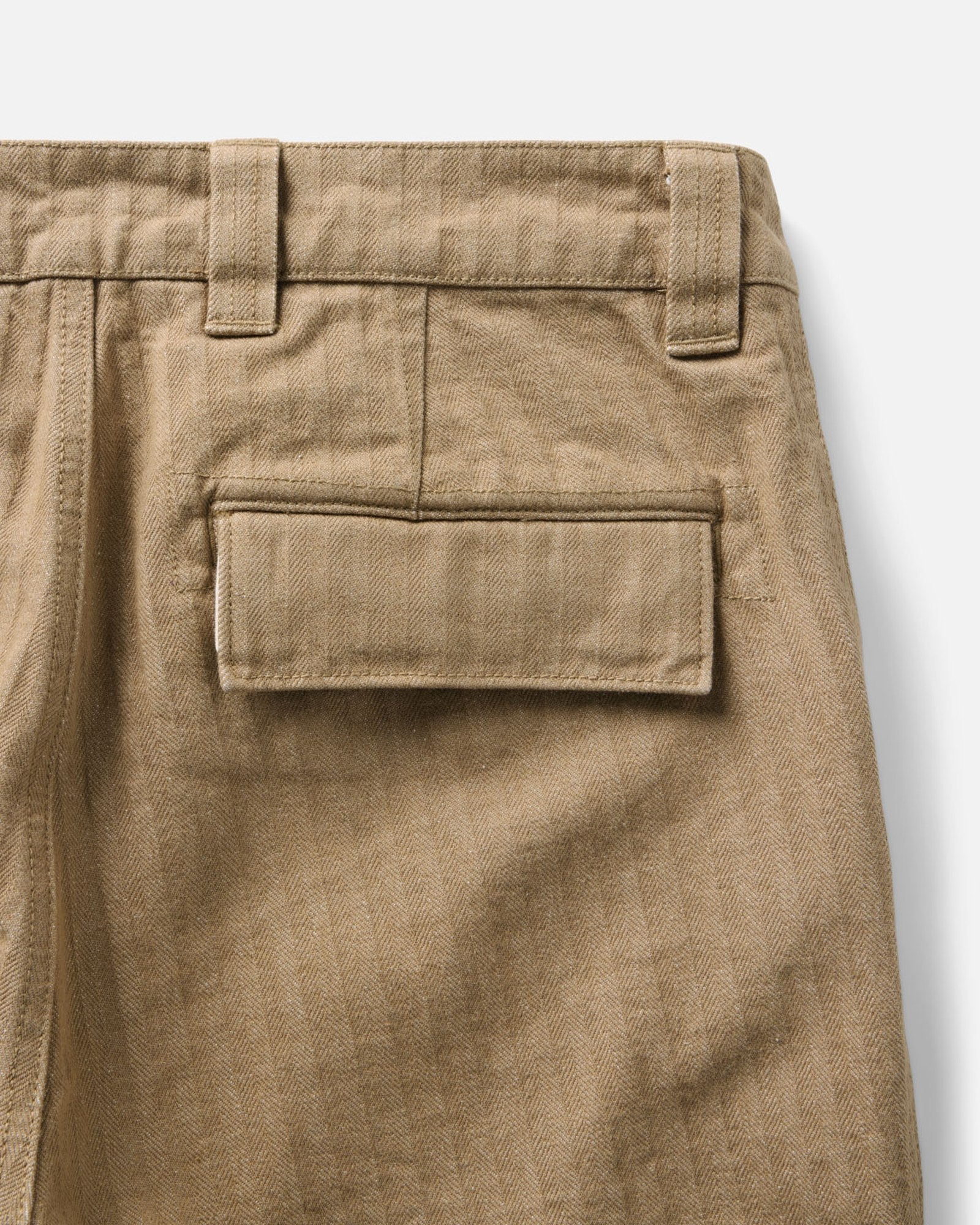 material shot of the back pocket on The Emlen Pant in Khaki Herringbone, Bottoms by Taylor Stitch