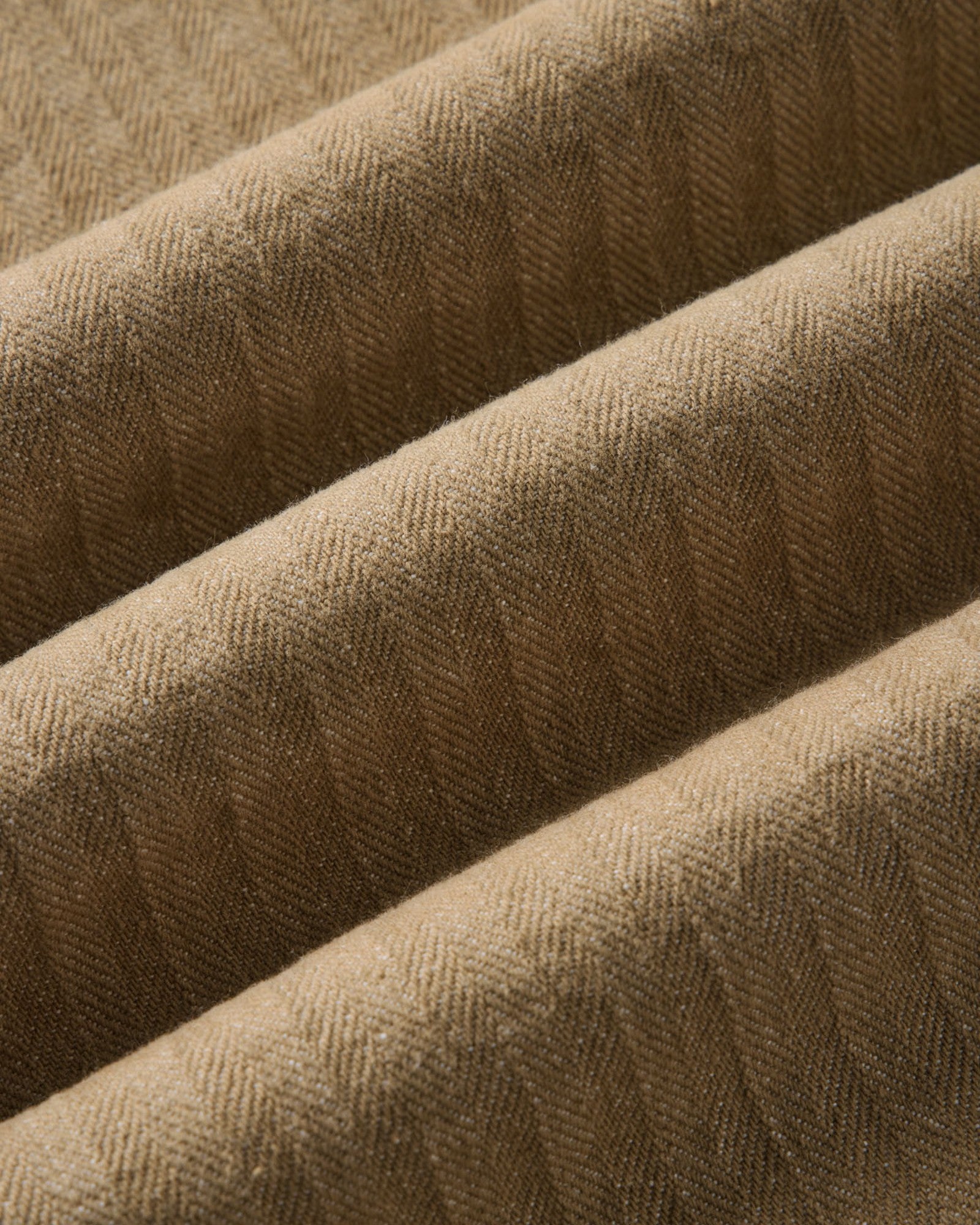 material shot of the fabric on The Emlen Pant in Khaki Herringbone, Bottoms by Taylor Stitch