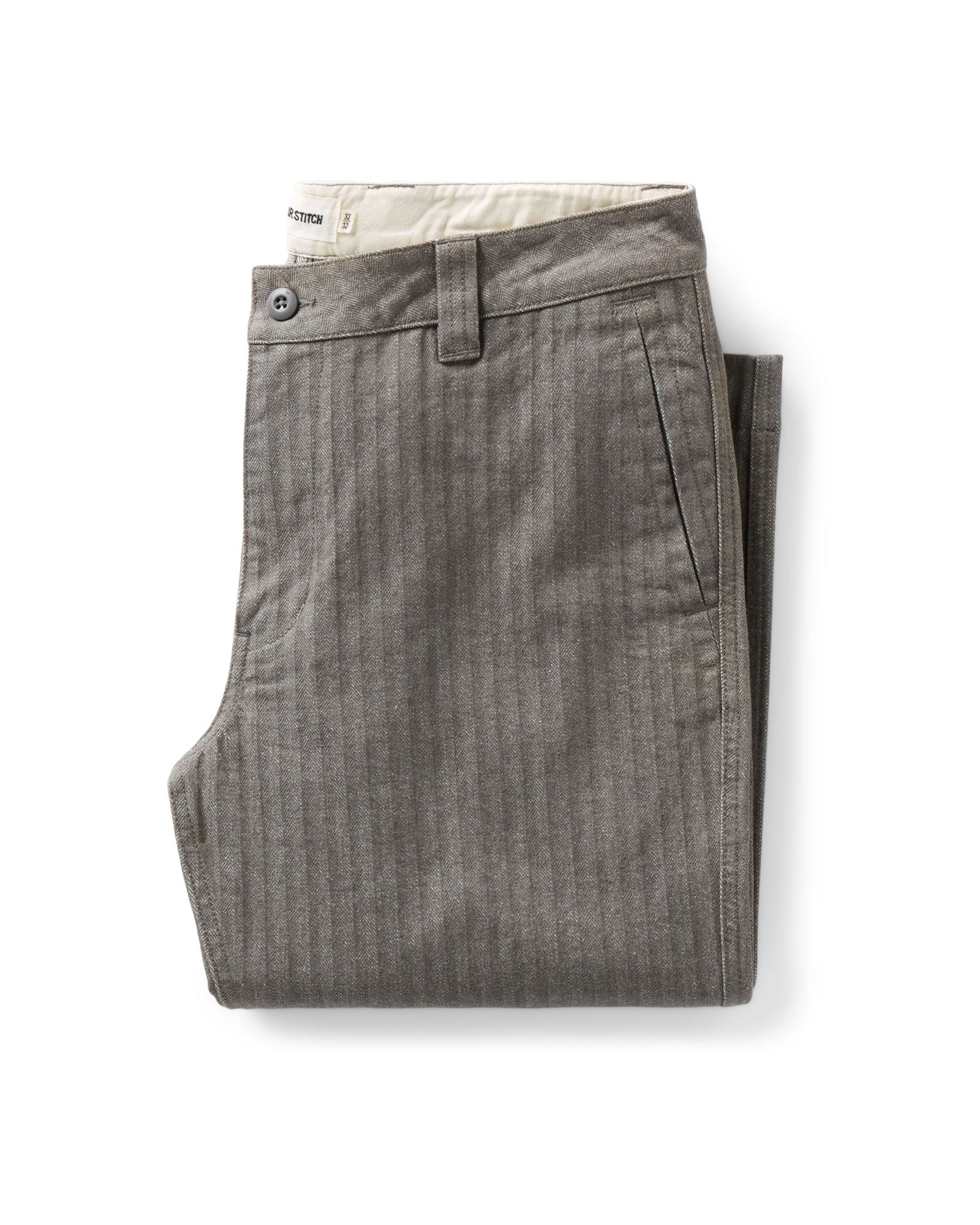 folded flatlay of The Emlen Pant in Smoked Olive Herringbone, Bottoms by Taylor Stitch