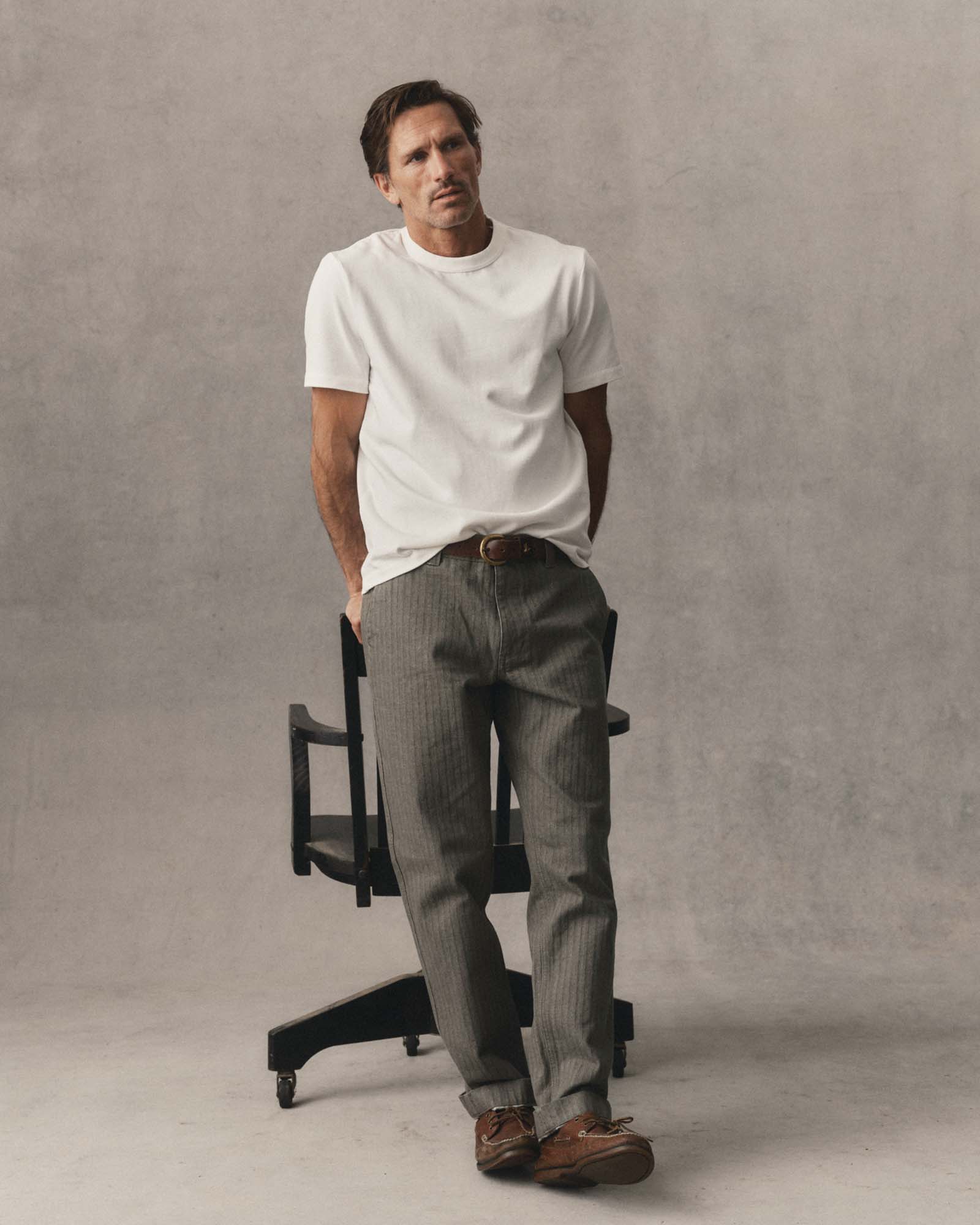 fit model showing off The Emlen Pant in Smoked Olive Herringbone, Bottoms by Taylor Stitch