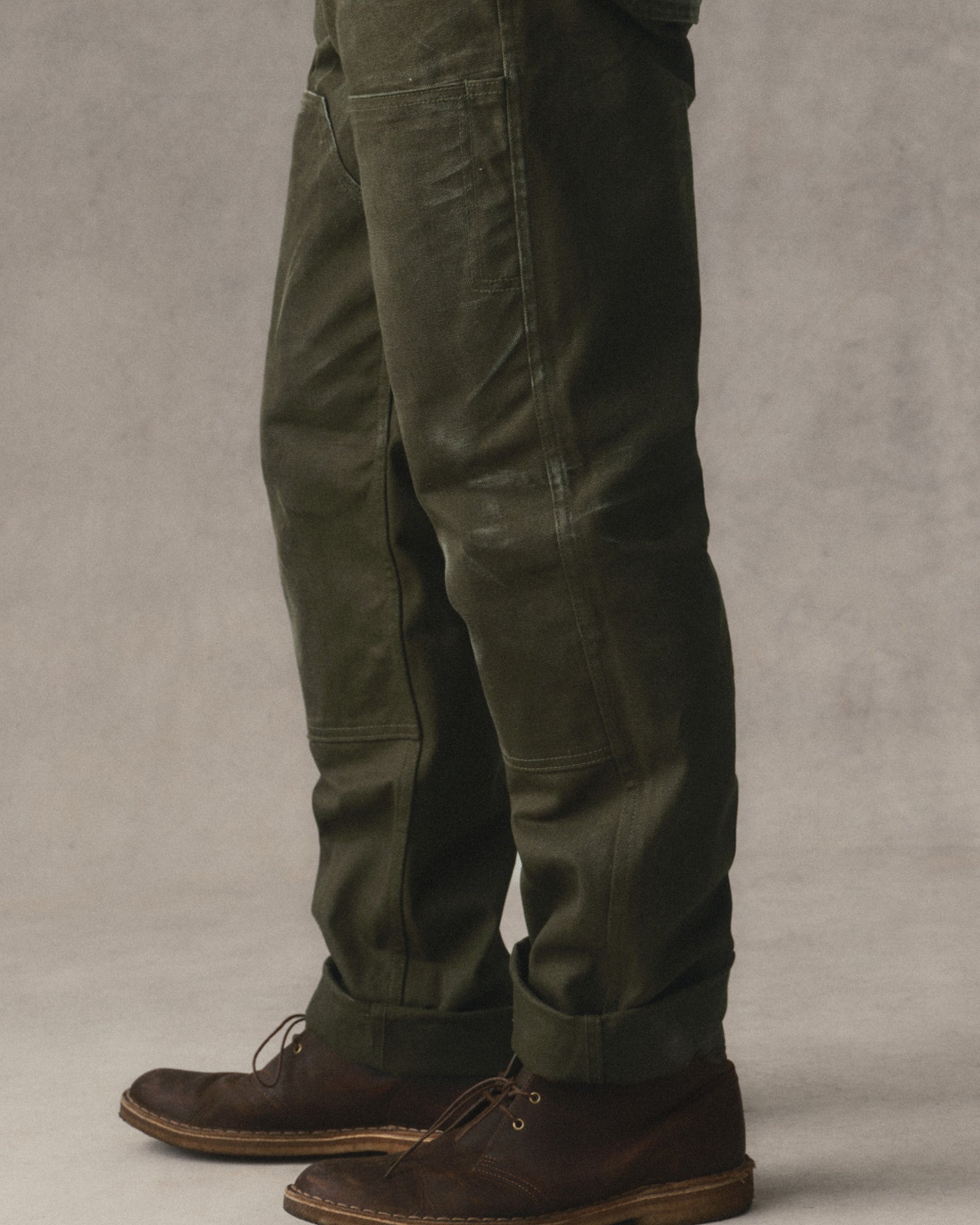 fit model showing the sides of The Good Acre Chore Pant in Olive Canvas, Bottoms by Taylor Stitch