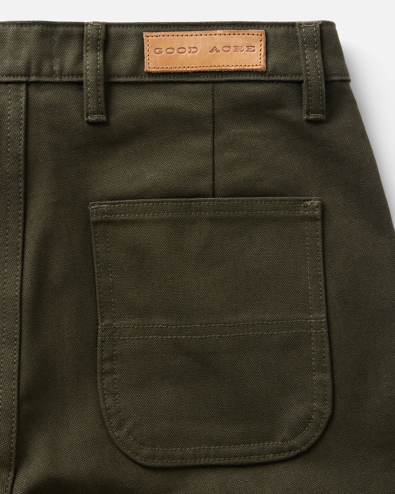 material shot of the back pocket on The Good Acre Chore Pant in Olive Canvas, Bottoms by Taylor Stitch