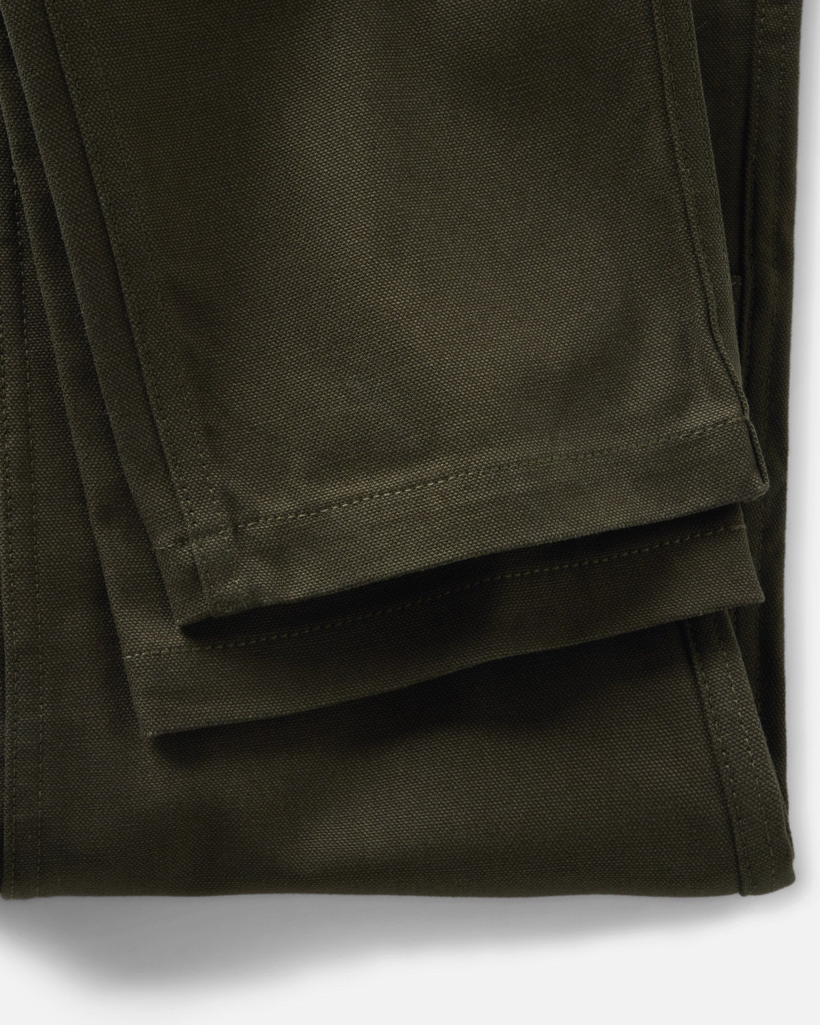 material shot of the hem on The Good Acre Chore Pant in Olive Canvas, Bottoms by Taylor Stitch
