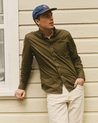 fit model leaning against the wall wearing The Jack in Bay Leaf Houndstooth