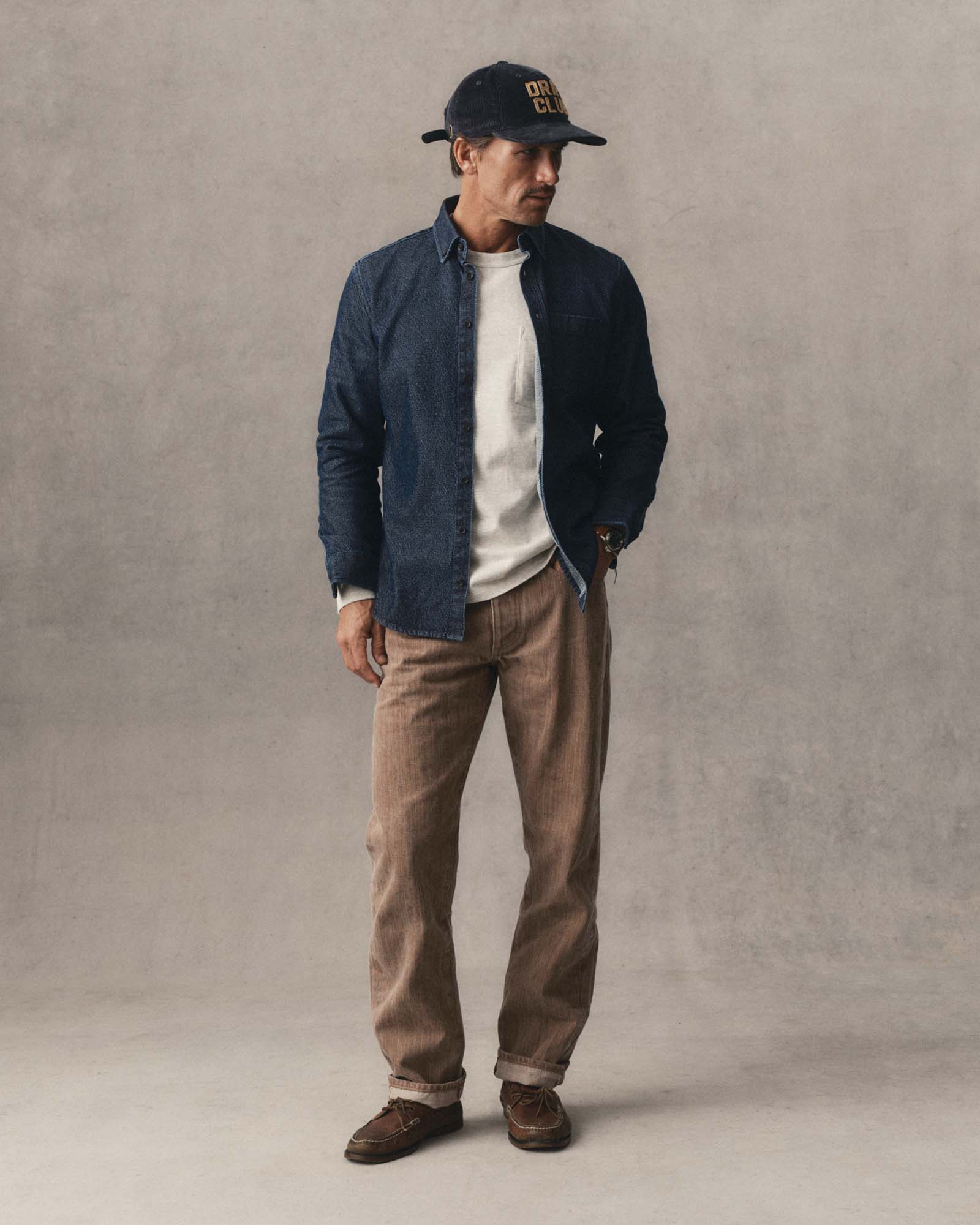 fit model posing in The Jack in Rinsed Indigo Japanese Jacquard Dot, Wovens by Taylor Stitch