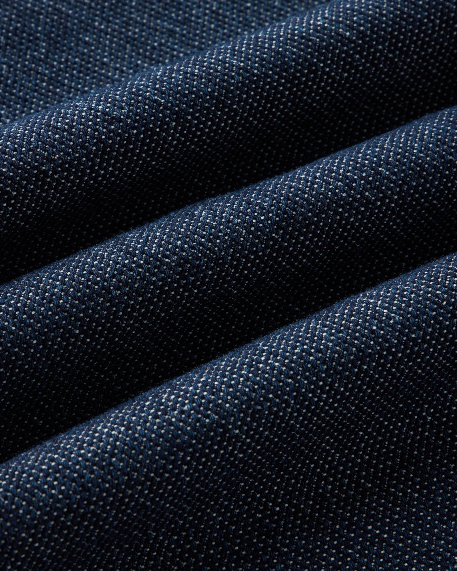 material shot of the fabric on The Jack in Rinsed Indigo Japanese Jacquard Dot, Wovens by Taylor Stitch