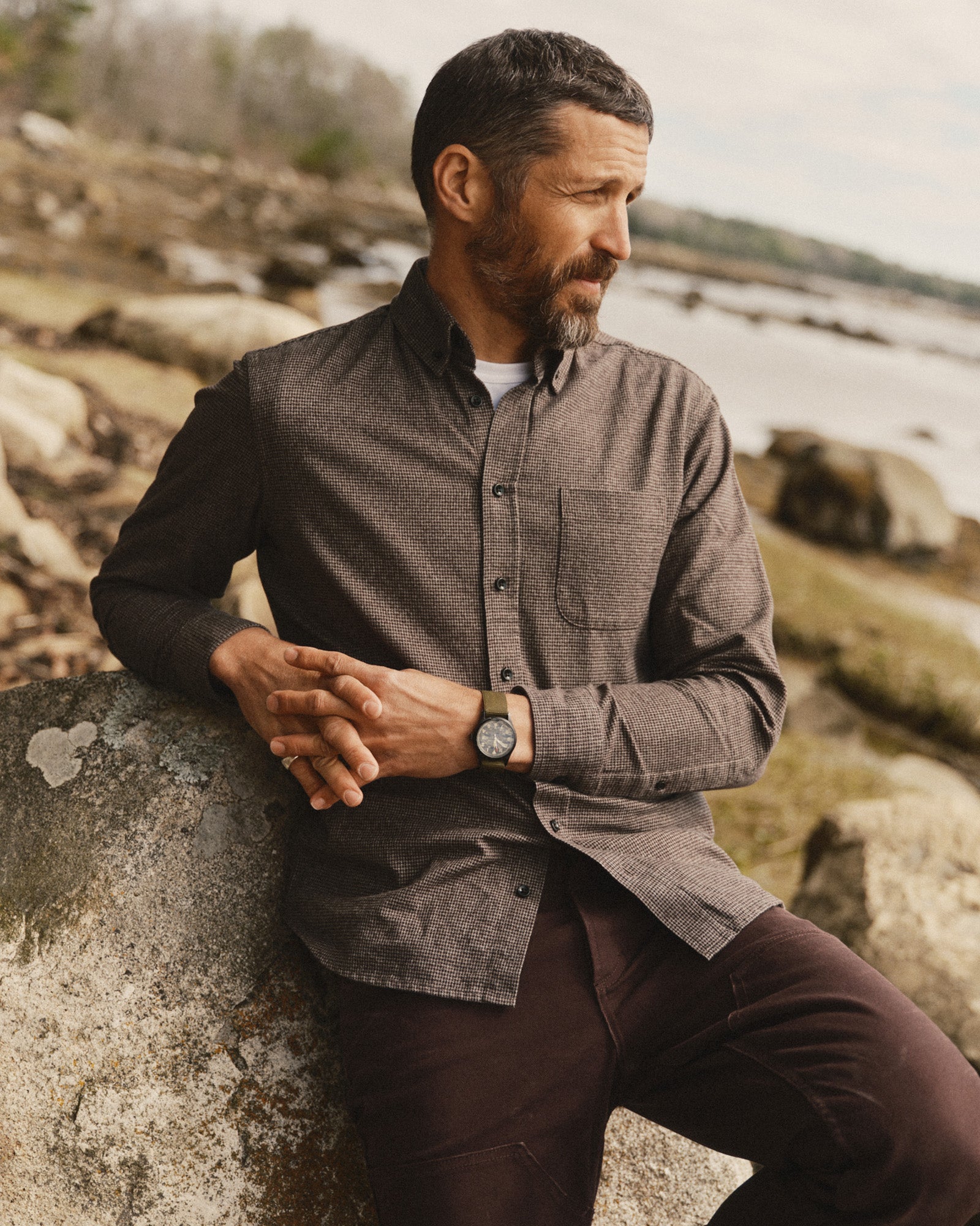 fit model sitting wearing The Jack in Timber Houndstooth, Wovens by Taylor Stitch