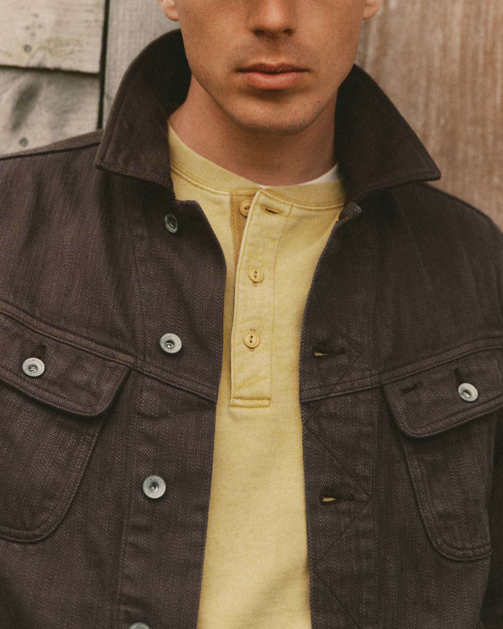 fit model showing off the collar on The Long Haul Jacket in Soil Slub Denim, Outerwear by Taylor Stitch