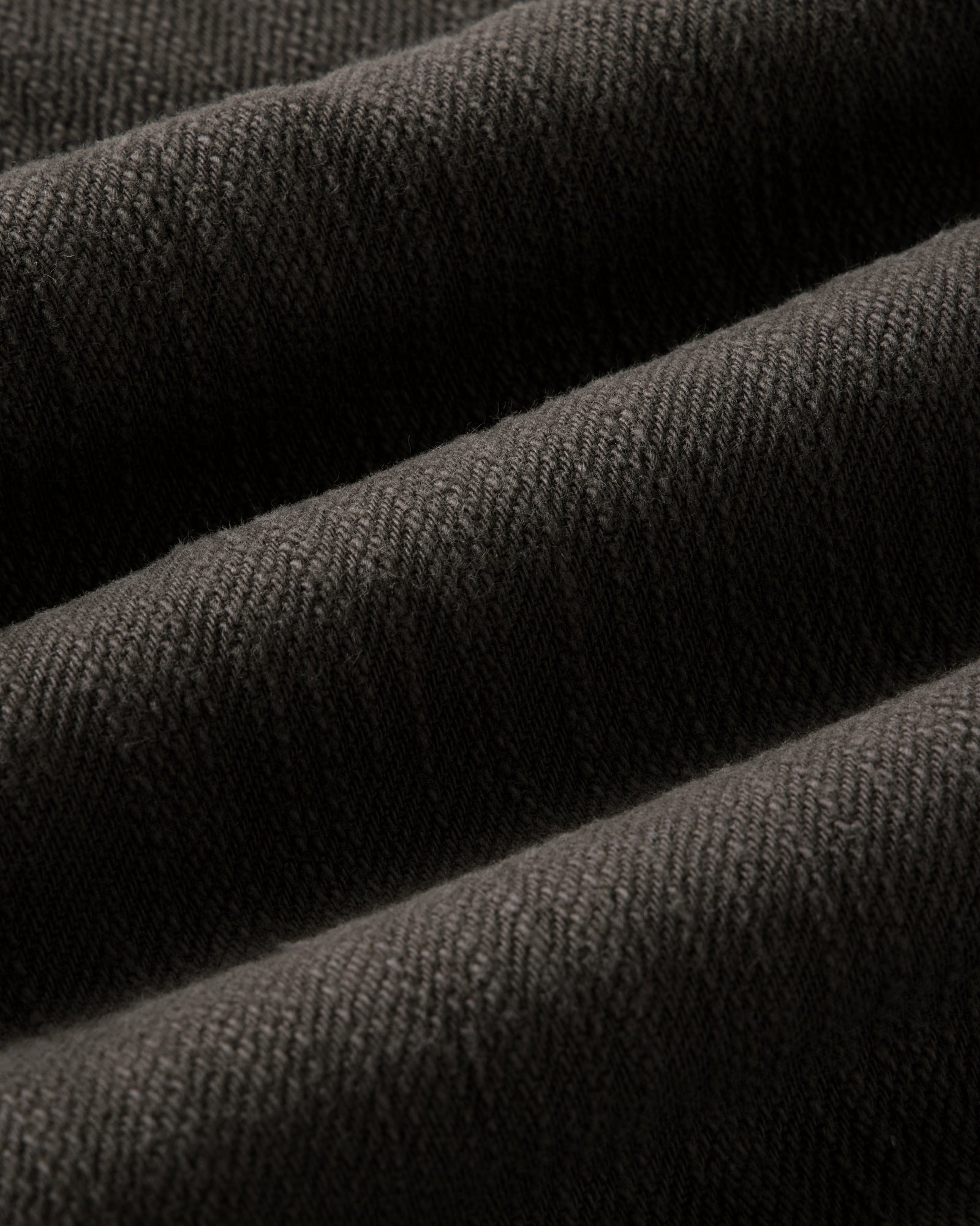 material shot of the fabric on The Long Haul Jacket in Soil Slub Denim, Outerwear by Taylor Stitch