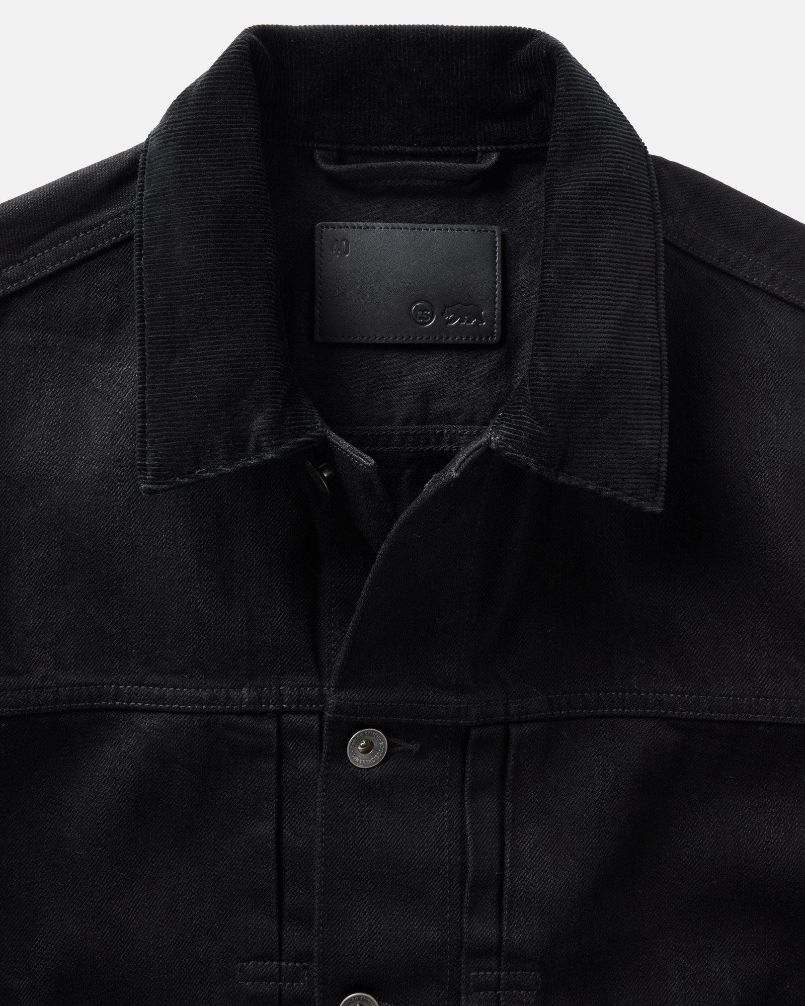 material shot of the collar on The Ryder Jacket in Rinsed Black Organic Selvedge, Outerwear by Taylor Stitch