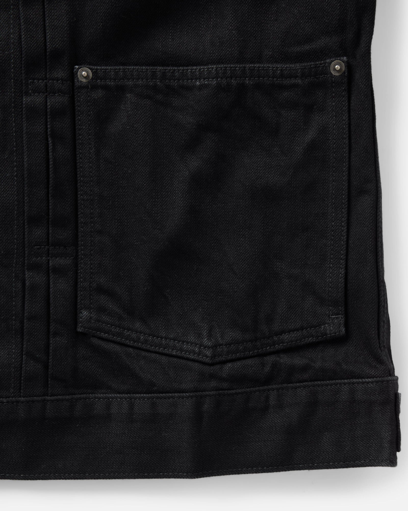 material shot of the pocket on The Ryder Jacket in Rinsed Black Organic Selvedge, Outerwear by Taylor Stitch