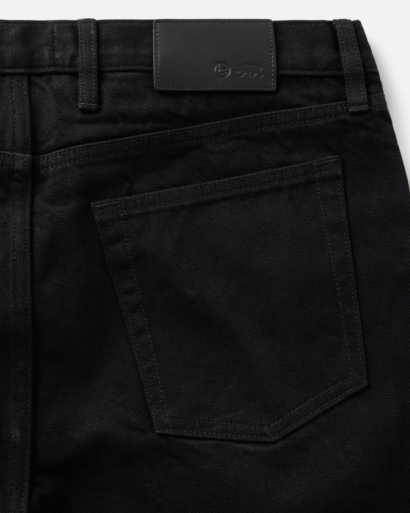 material shot of the pocket on The Straight Jean in Rinsed Black Organic Selvedge, Bottoms by Taylor Stitch