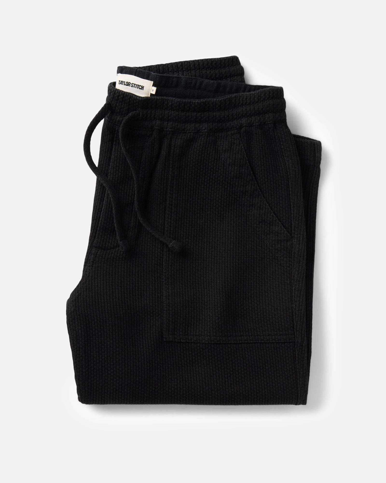 folded flatlay of The Breakwater Pant in Black Indigo Sashiko, Bottoms by Taylor Stitch