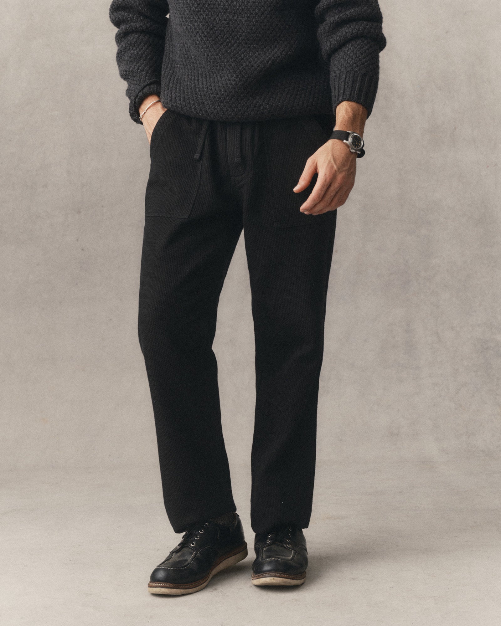 fit model posing in The Breakwater Pant in Black Indigo Sashiko, Bottoms by Taylor Stitch