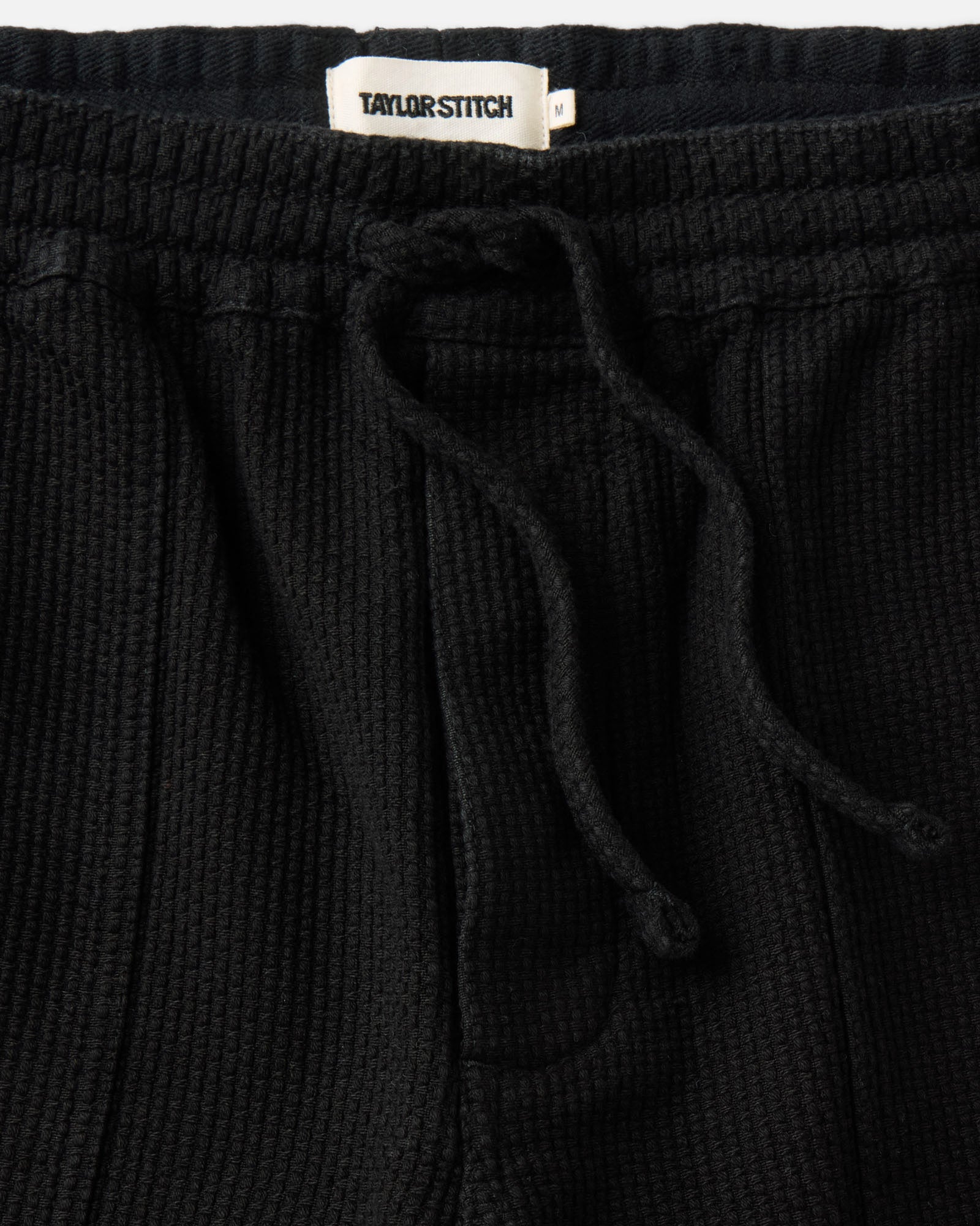 material shot of the waistband on The Breakwater Pant in Black Indigo Sashiko, Bottoms by Taylor Stitch