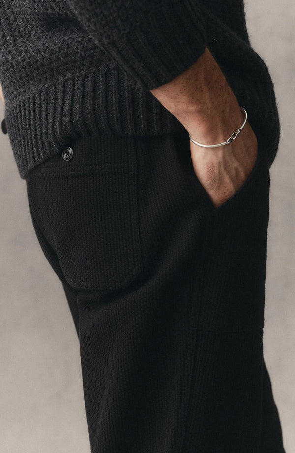 fit model with his hand in the pocket of The Breakwater Pant in Black Indigo Sashiko