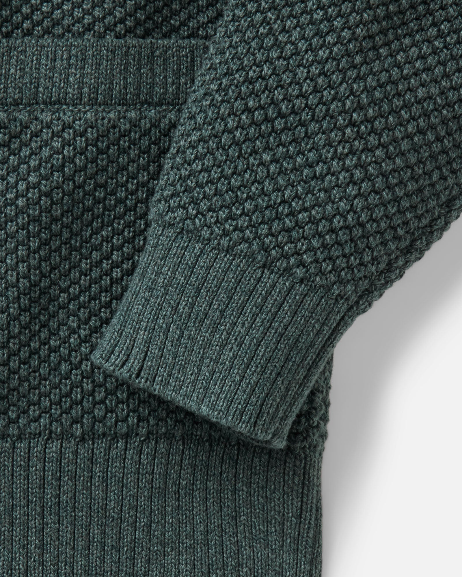 material shot of the sleeve on The Crawford Sweater in Dark Forest Twist, Sweaters by Taylor Stitch