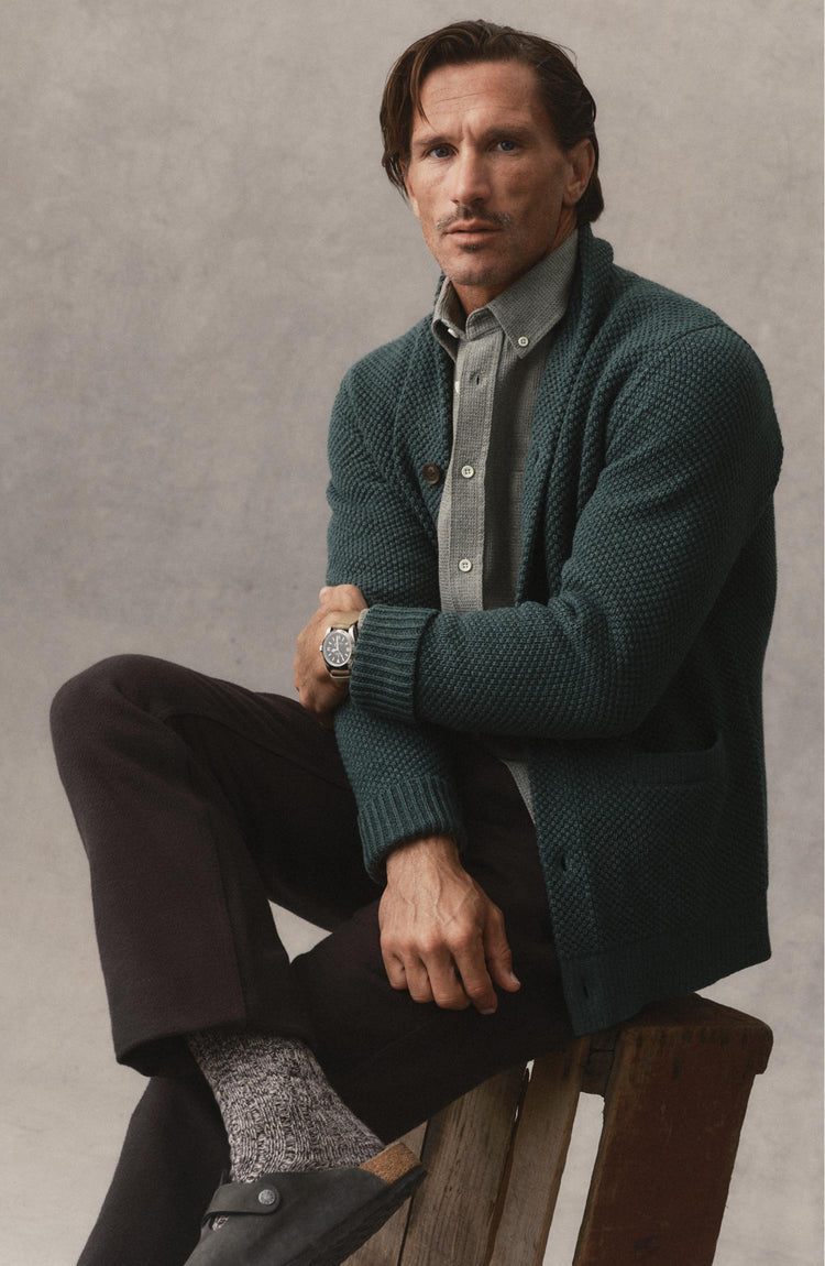 fit model posing in The Crawford Sweater in Dark Forest Twist