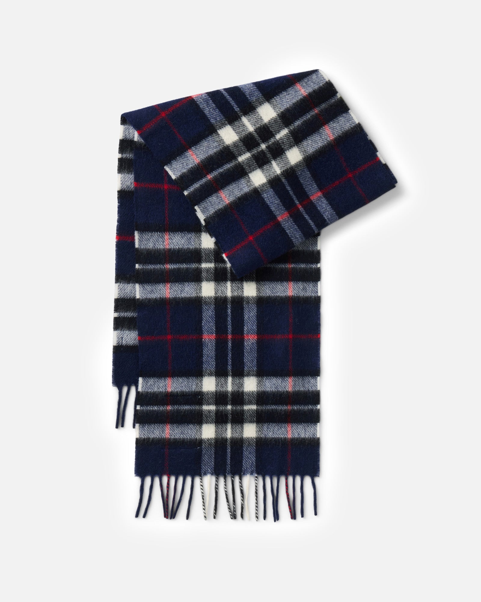 flatlay of The Fireside Scarf in Eddy Plaid, Accessories by Taylor Stitch