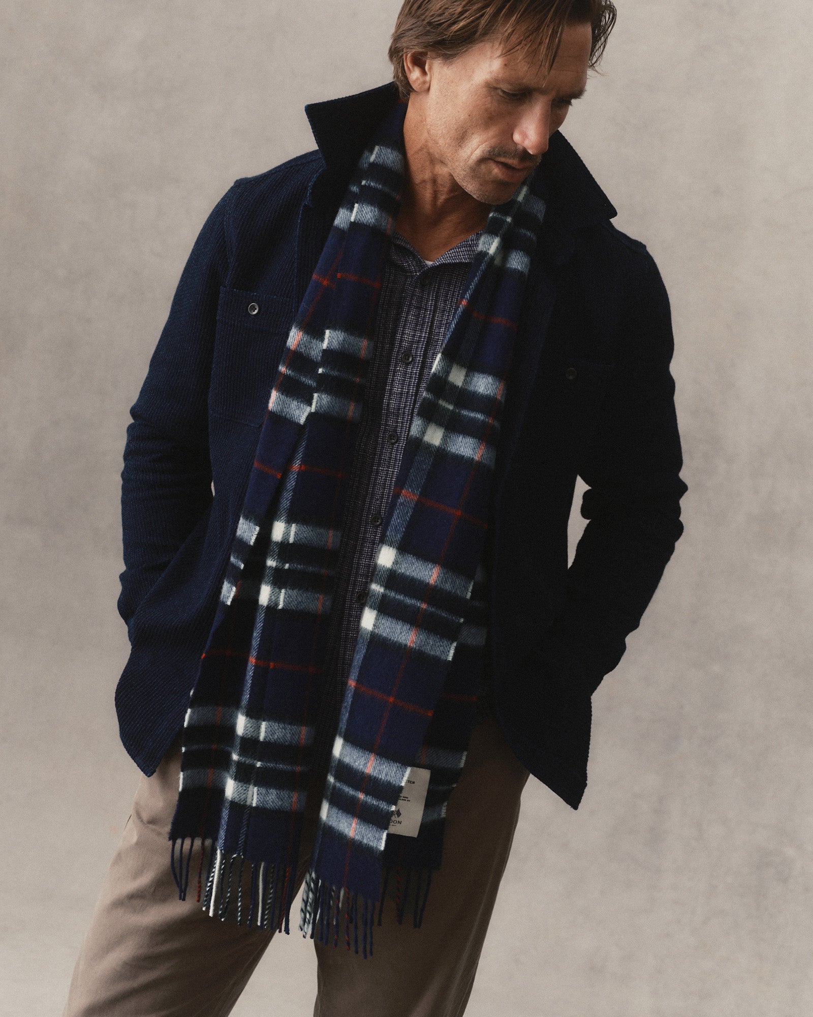 fit model showing off The Fireside Scarf in Eddy Plaid, Accessories by Taylor Stitch